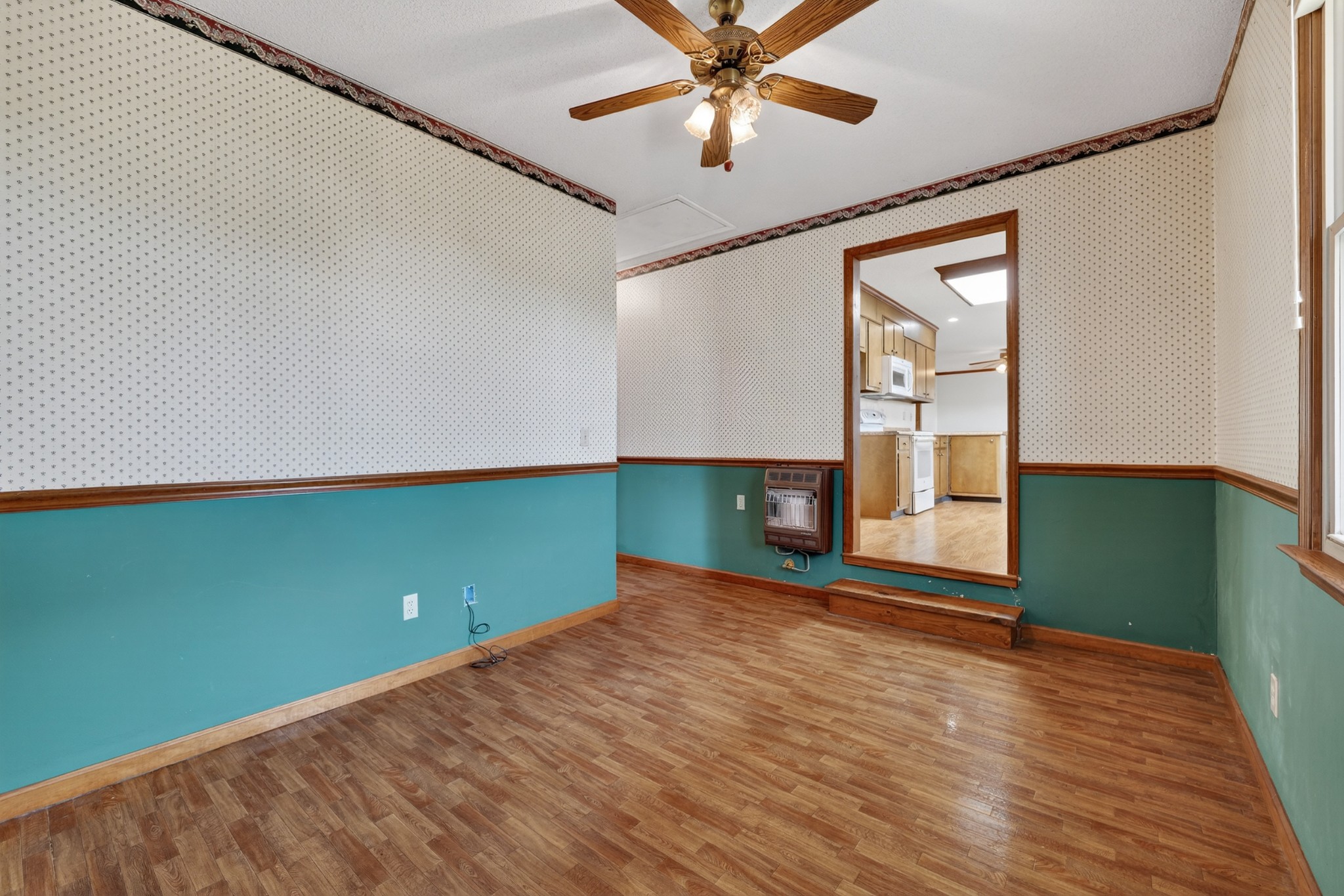 679 Howell Hill Road Flintville, TN 37335 - Photo 16 of 44 a view of a room with window and wooden floor