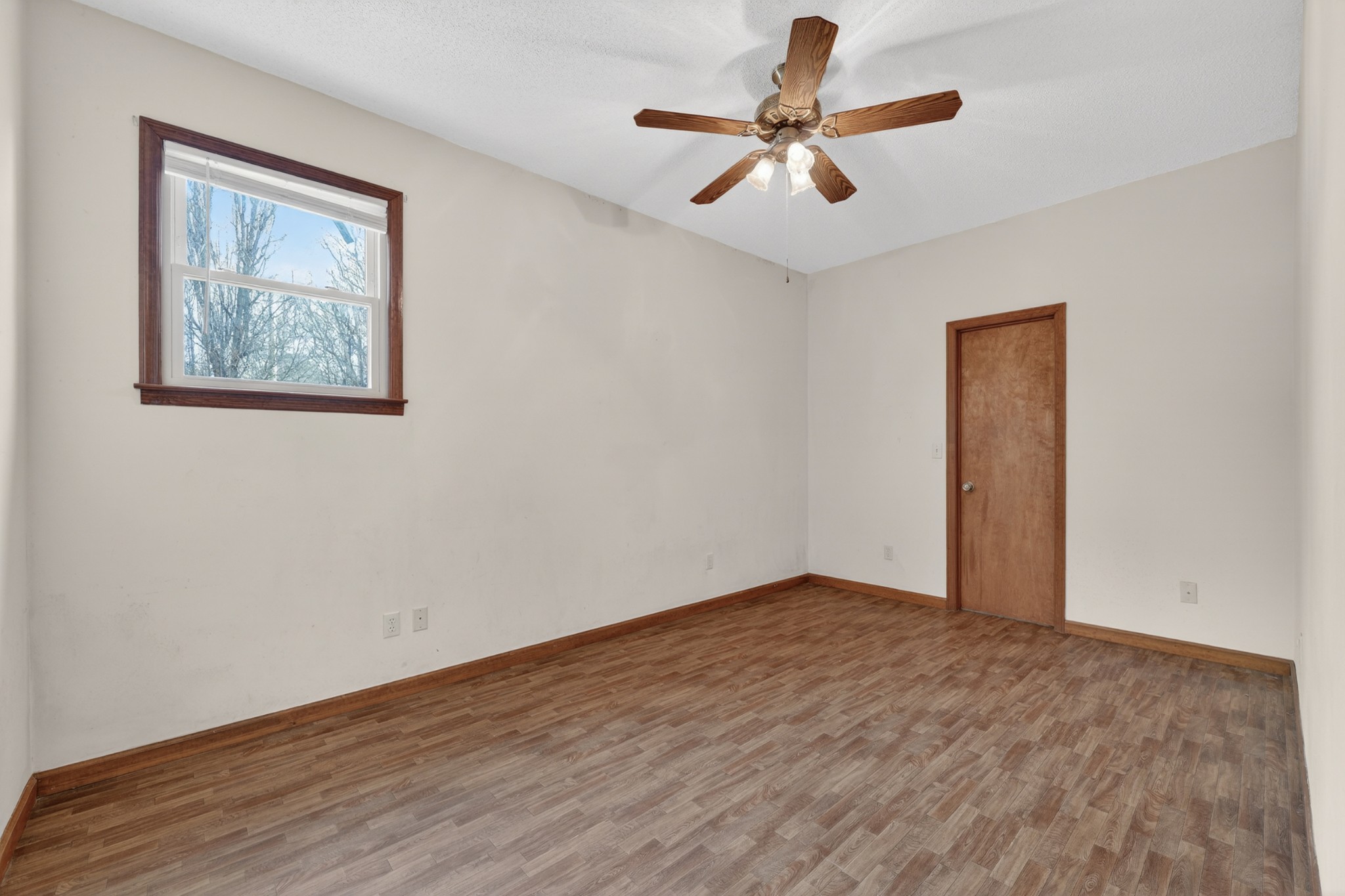 679 Howell Hill Road Flintville, TN 37335 - Photo 19 of 44 a view of an empty room with a window