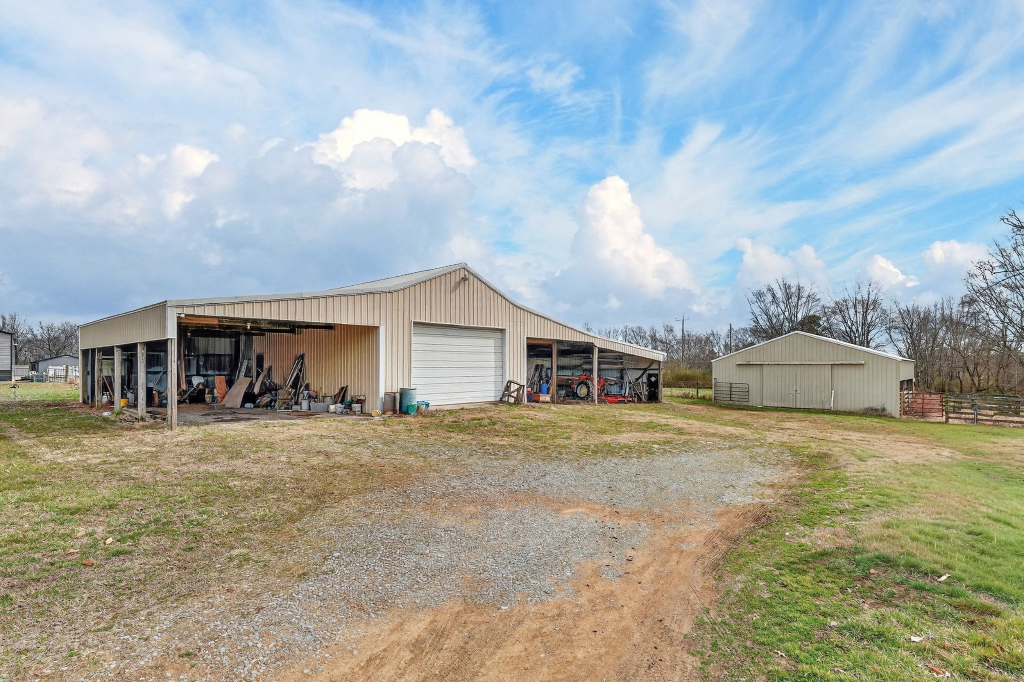 679 Howell Hill Road Flintville, TN 37335 - Photo 25 of 44 a front view of a house with a yard and garage