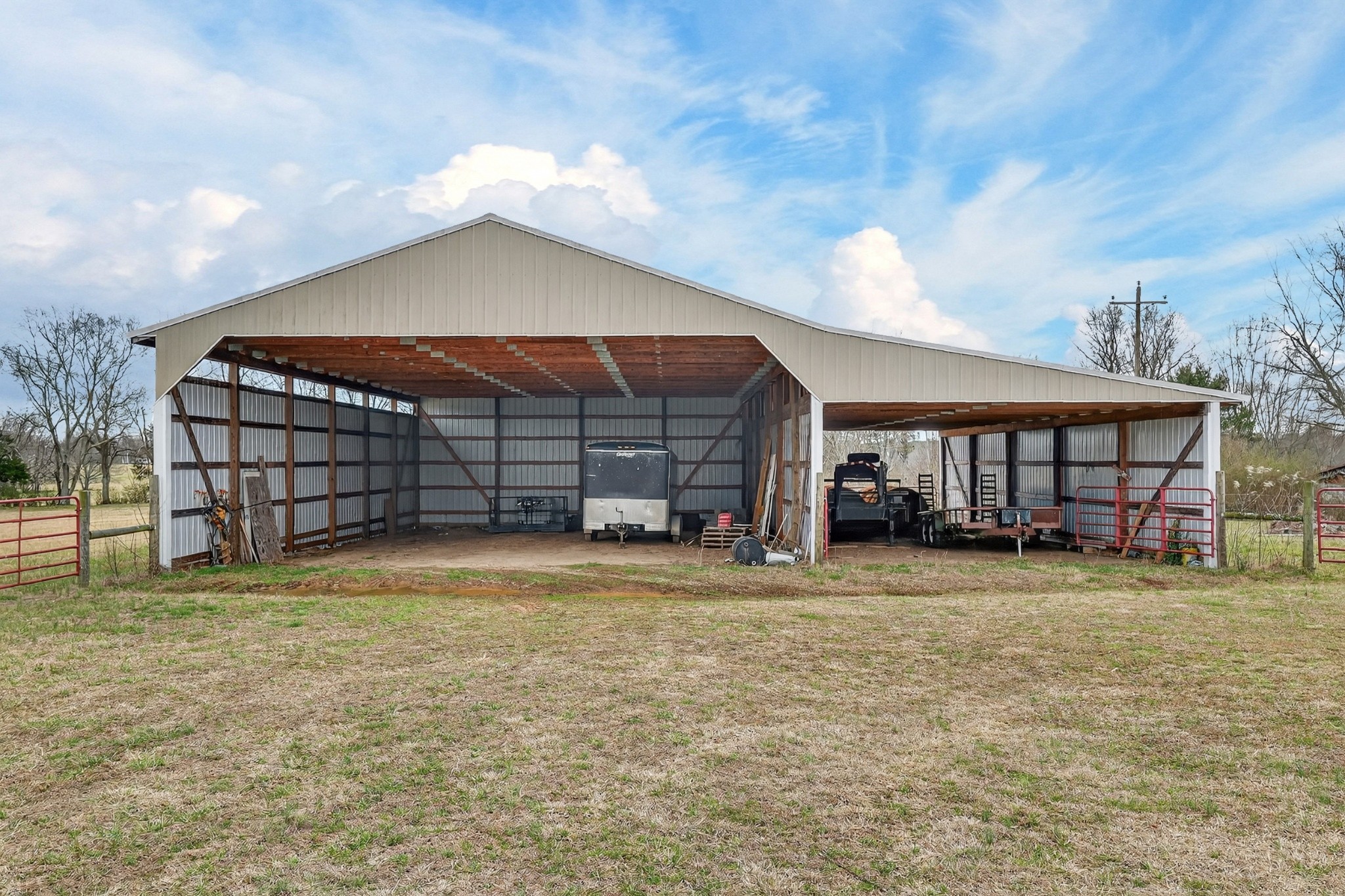 679 Howell Hill Road Flintville, TN 37335 - Photo 32 of 44 a view of a house with a yard and garage