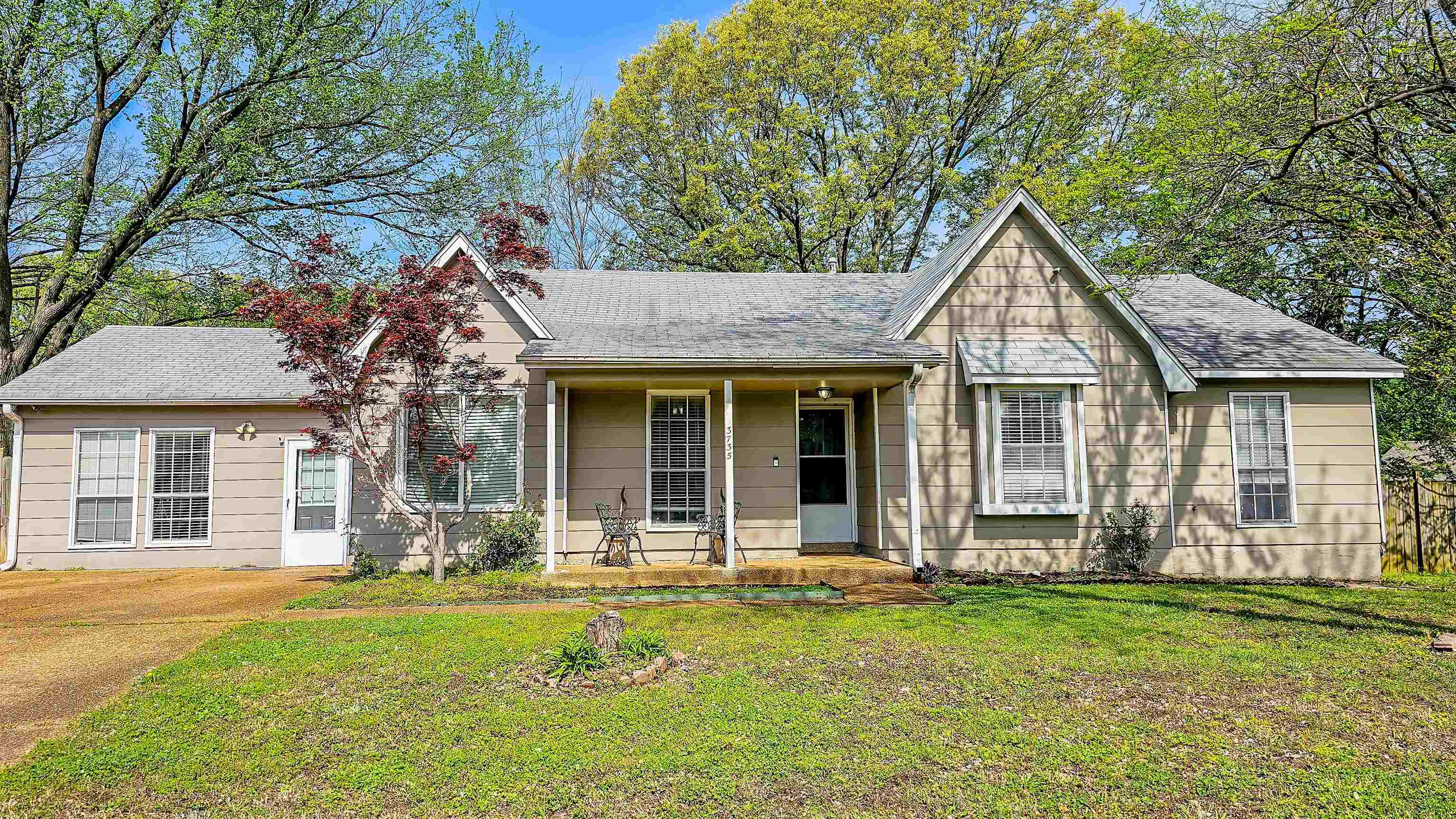 3735 Rippling Creek Cove Memphis, TN 38135 - Photo 1 of 28 front view of a house with a yard