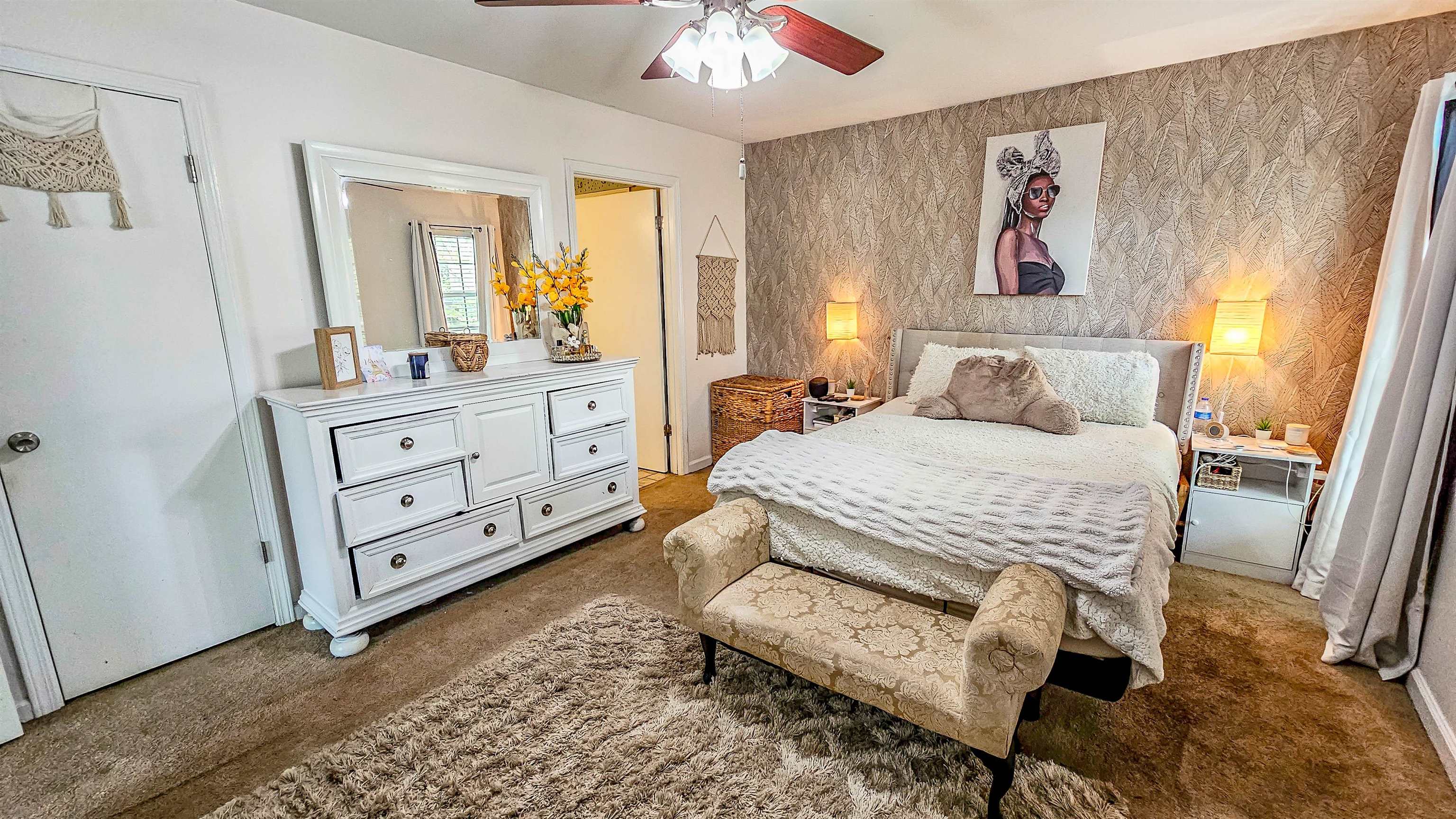 3735 Rippling Creek Cove Memphis, TN 38135 - Photo 16 of 28 a bedroom with a bed and a mirror on dresser