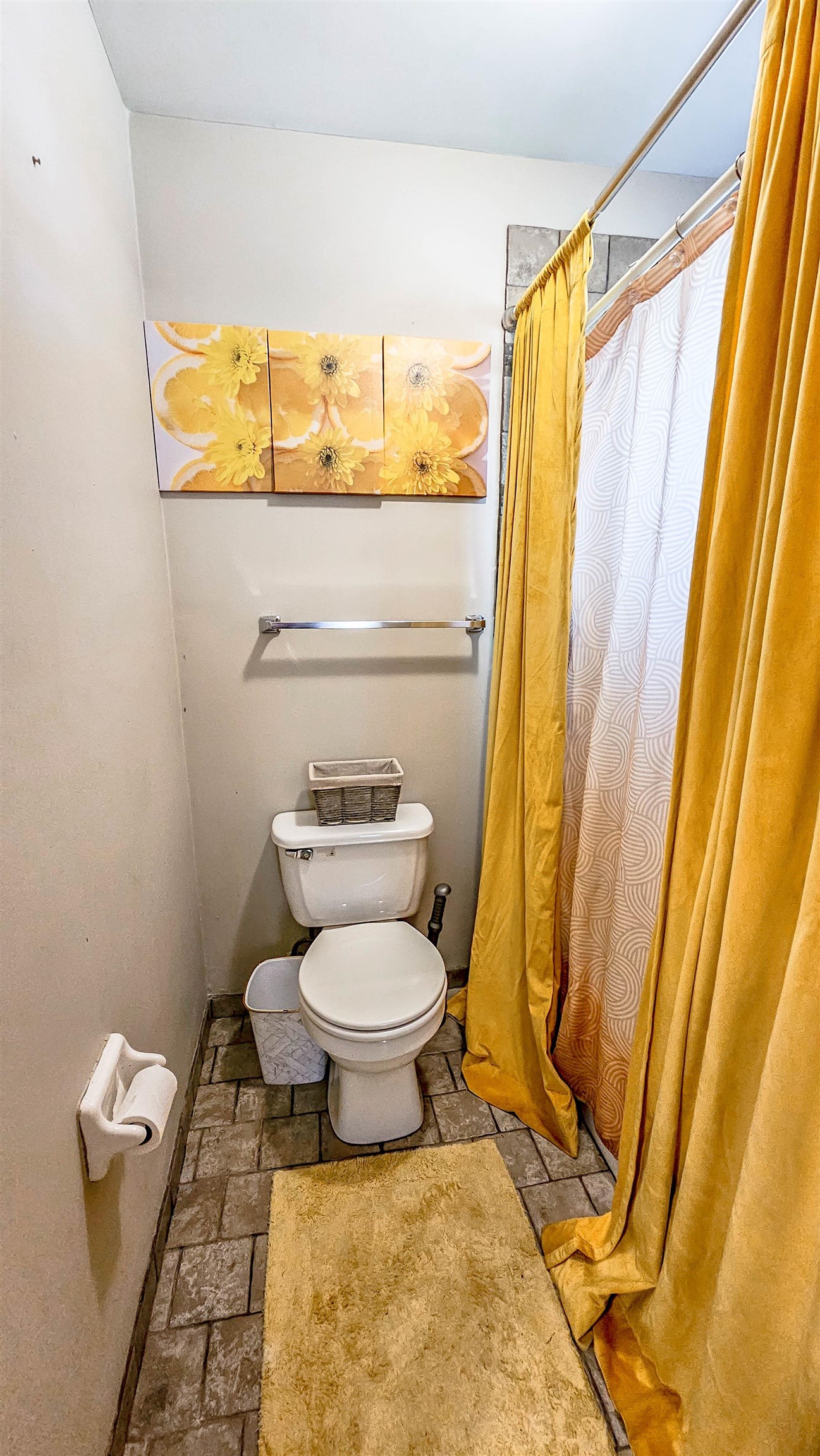 3735 Rippling Creek Cove Memphis, TN 38135 - Photo 19 of 28 a bathroom with a toilet and a shower curtain
