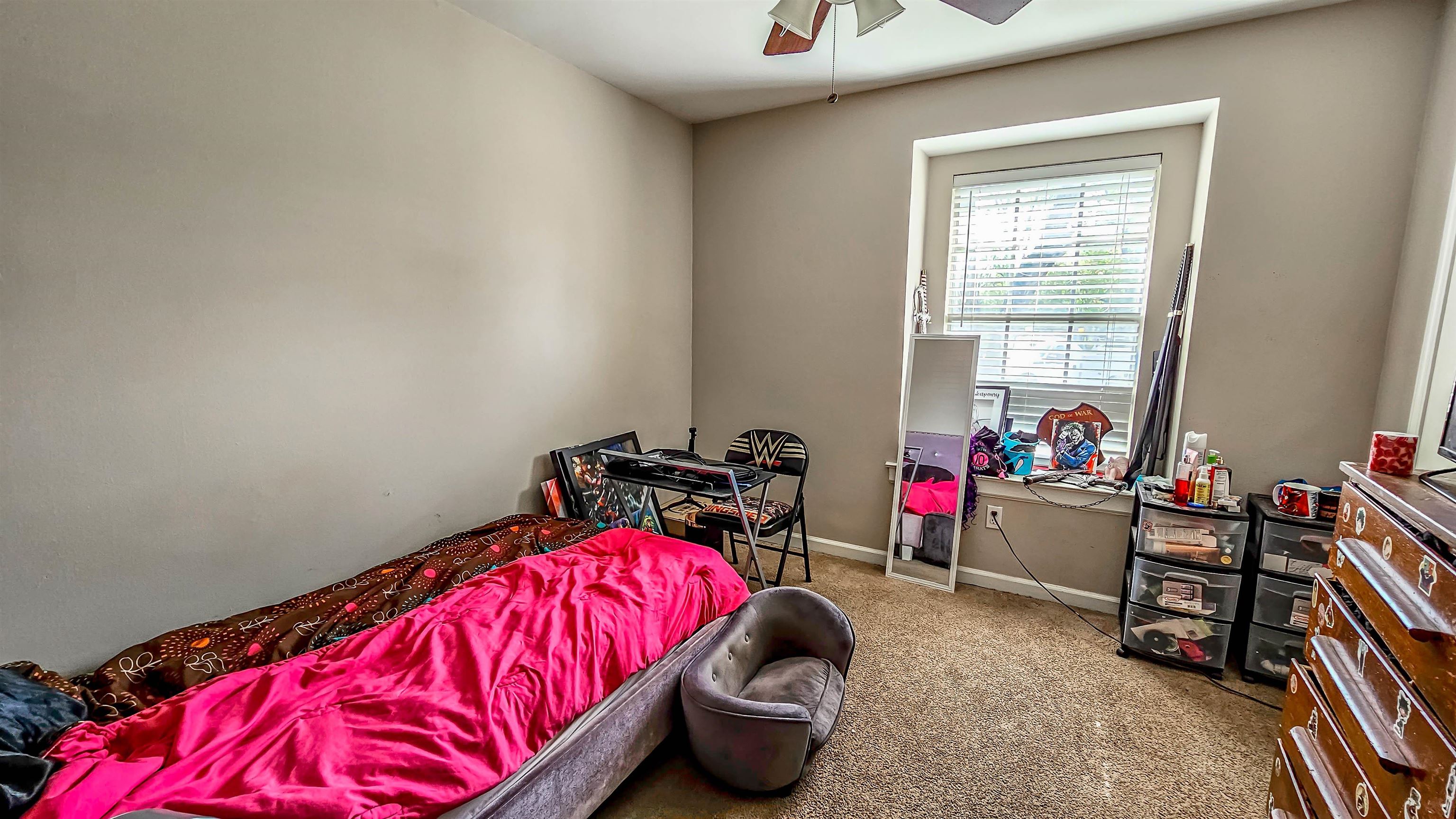 3735 Rippling Creek Cove Memphis, TN 38135 - Photo 20 of 28 a room with a bed and toys