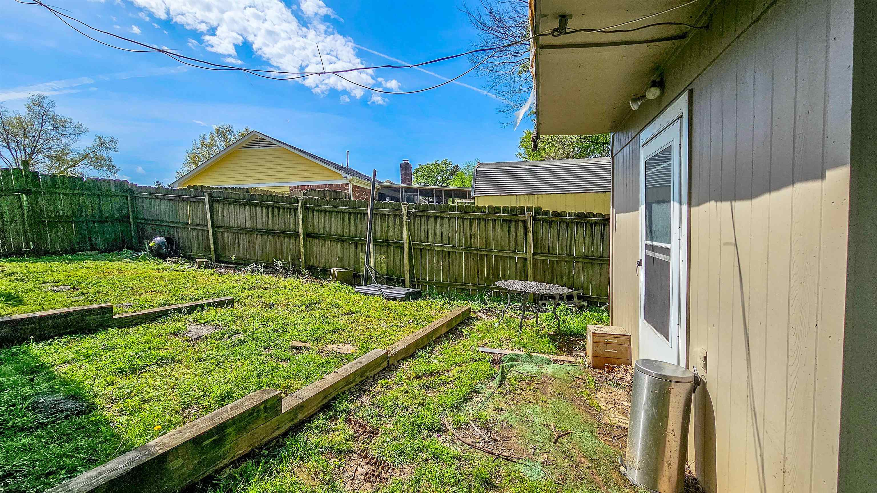 3735 Rippling Creek Cove Memphis, TN 38135 - Photo 25 of 28 a view of an house with backyard and patio