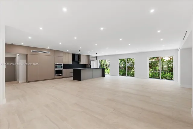 a view of an empty room with a stove