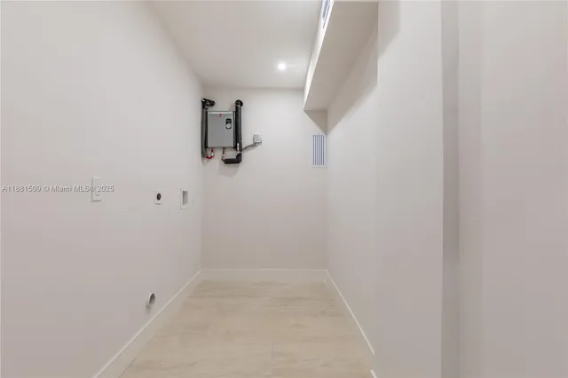 a view of a table and chairs in the patio