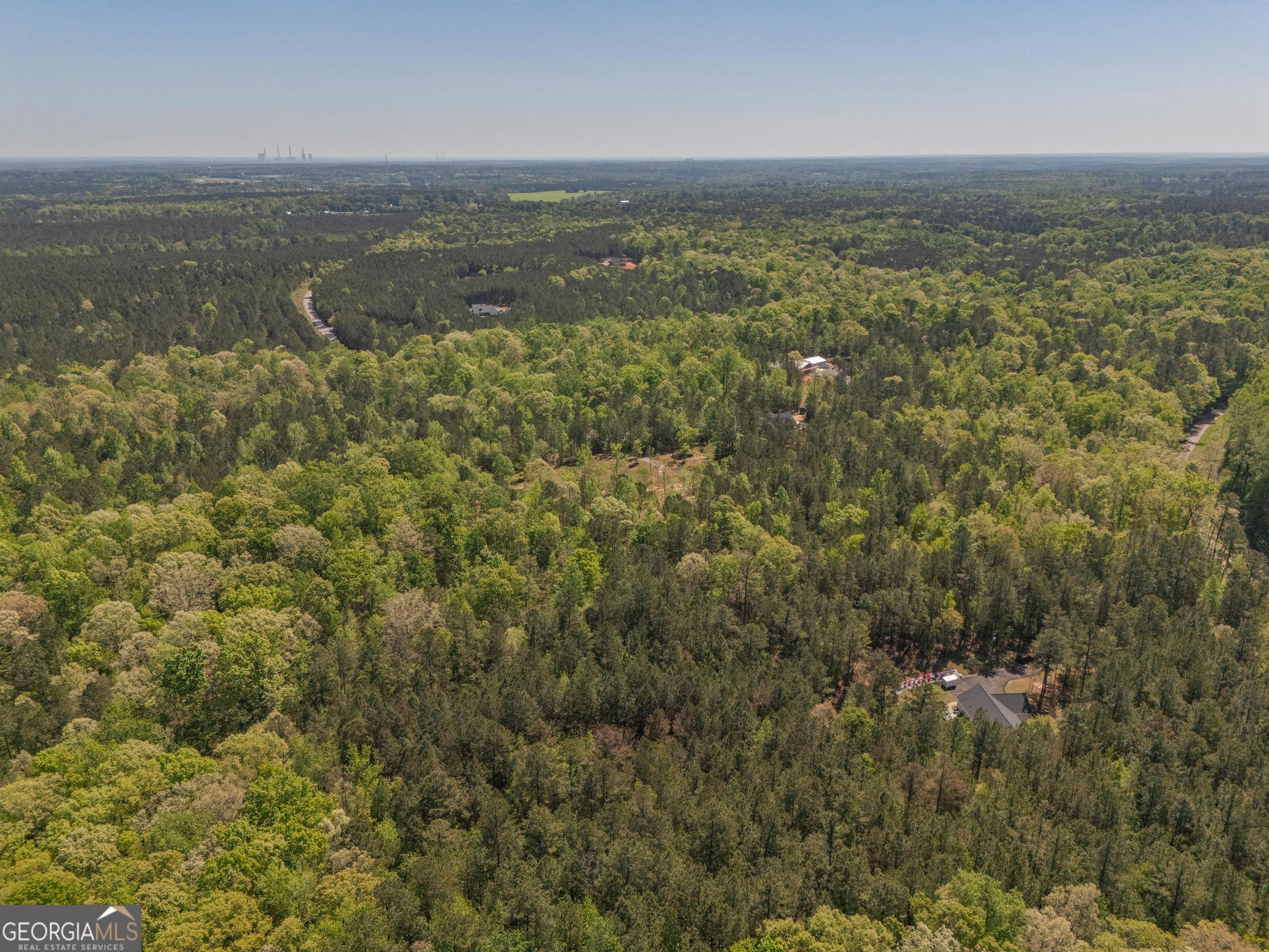 302 Goodwyne Road Forsyth, GA 31029 - Photo 6 of 17 a view of a room with an ocean and mountain view
