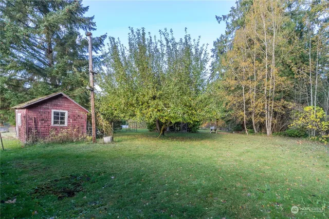 a view of a yard in front of a house
