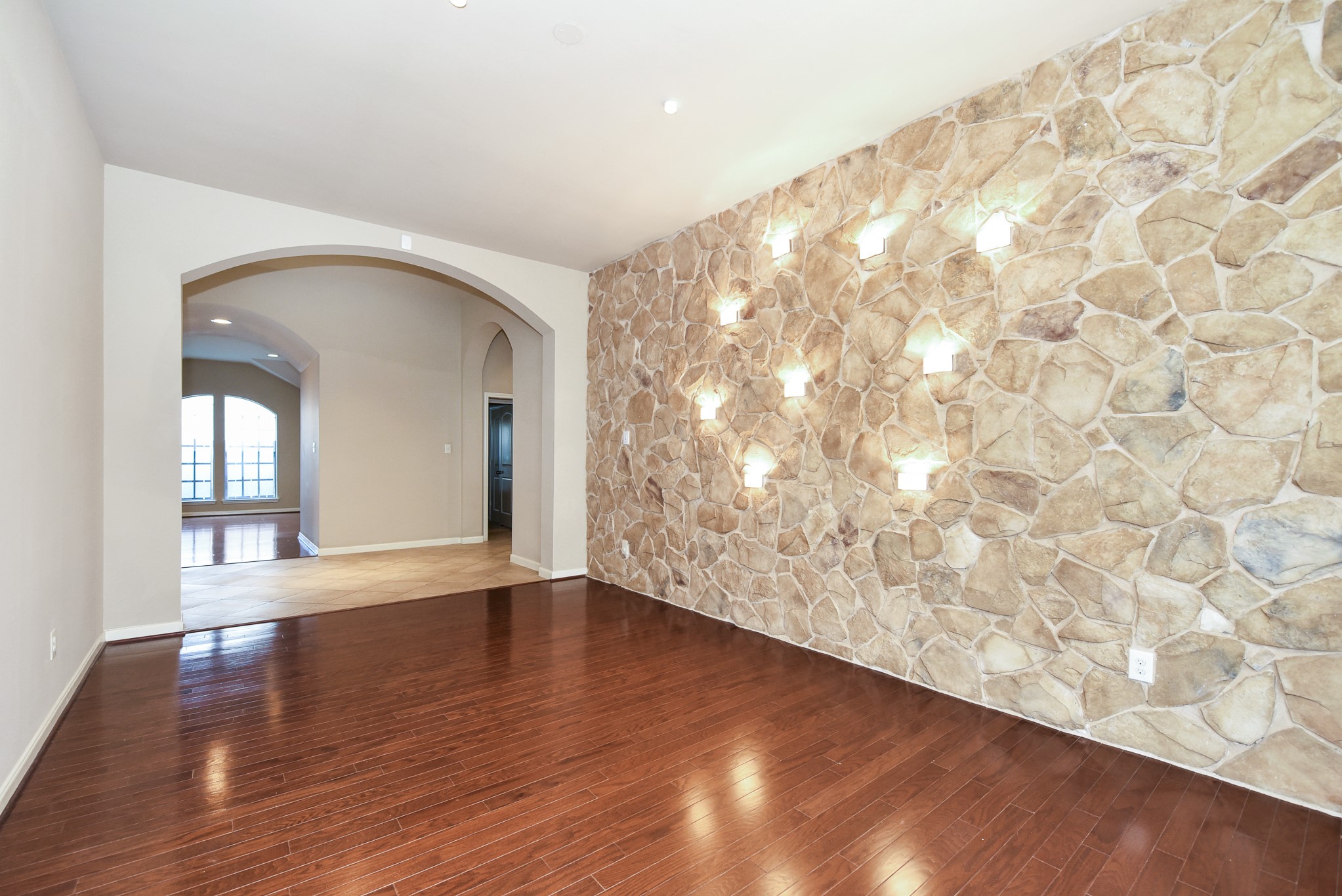 26202 Basil View Lane Katy, TX 77494 - Photo 11 of 29 a view of an empty room and wooden floor