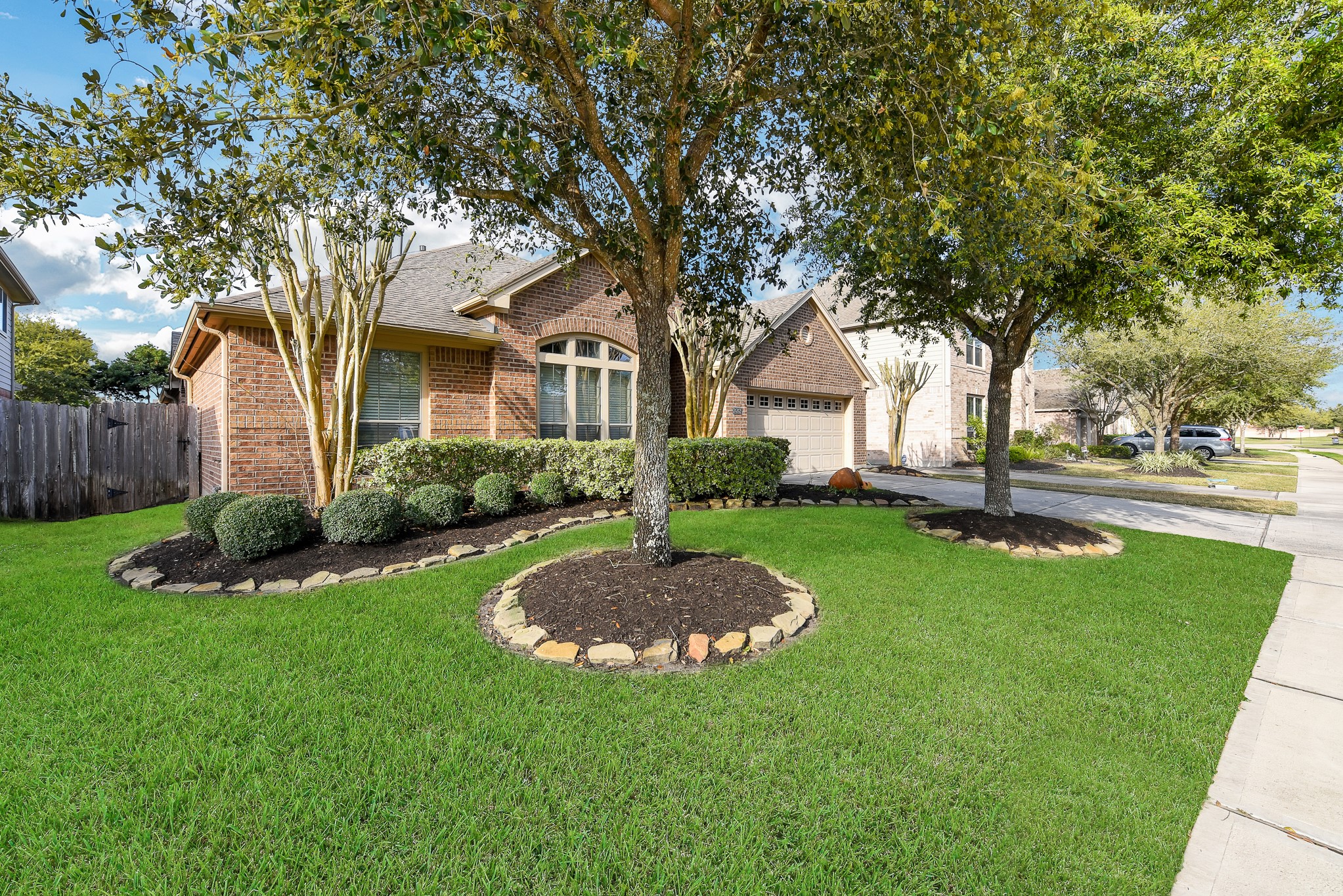 26202 Basil View Lane Katy, TX 77494 - Photo 2 of 29 a view of a house with a big yard and large tree