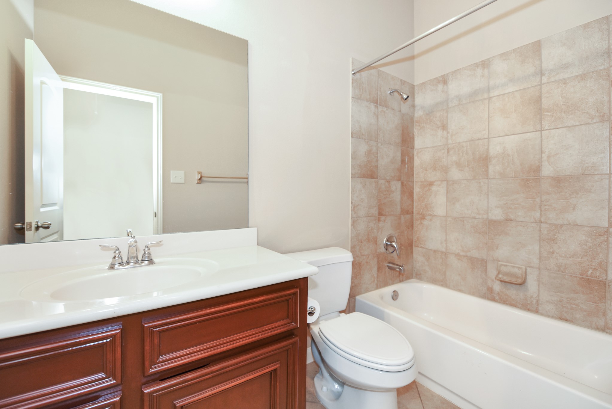 26202 Basil View Lane Katy, TX 77494 - Photo 23 of 29 a bathroom with a sink a toilet and a bathtub