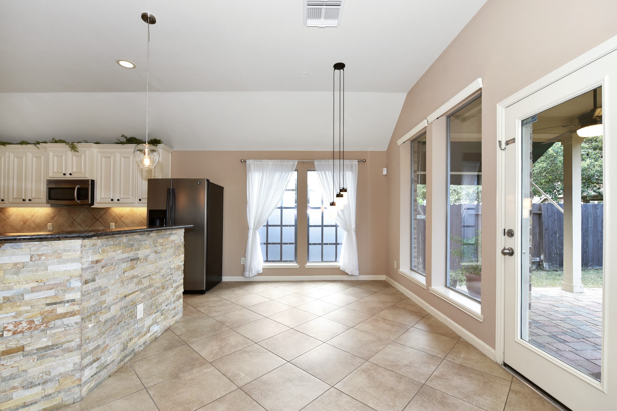 26202 Basil View Lane Katy, TX 77494 - Photo 6 of 29 a large kitchen with cabinets and stainless steel appliances