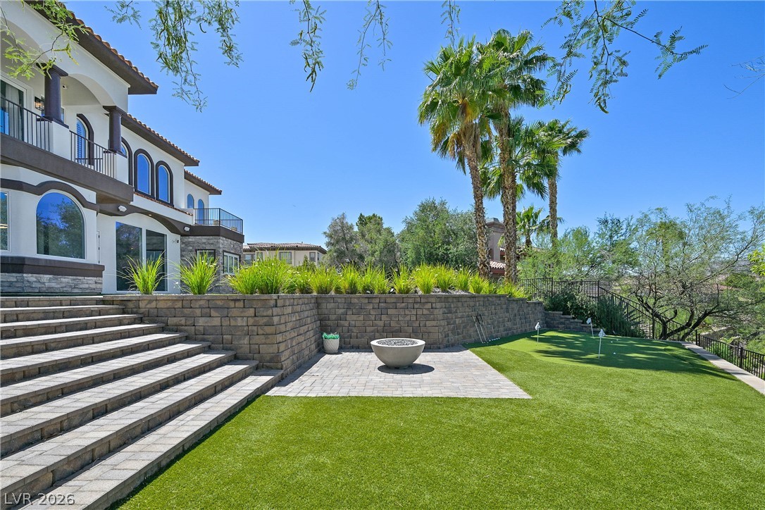 6 Rue Du Ville Henderson, NV 89011 - Photo 81 of 99 This magnificent residence boasts a spacious outdoor area, ideal for relaxation and entertaining.