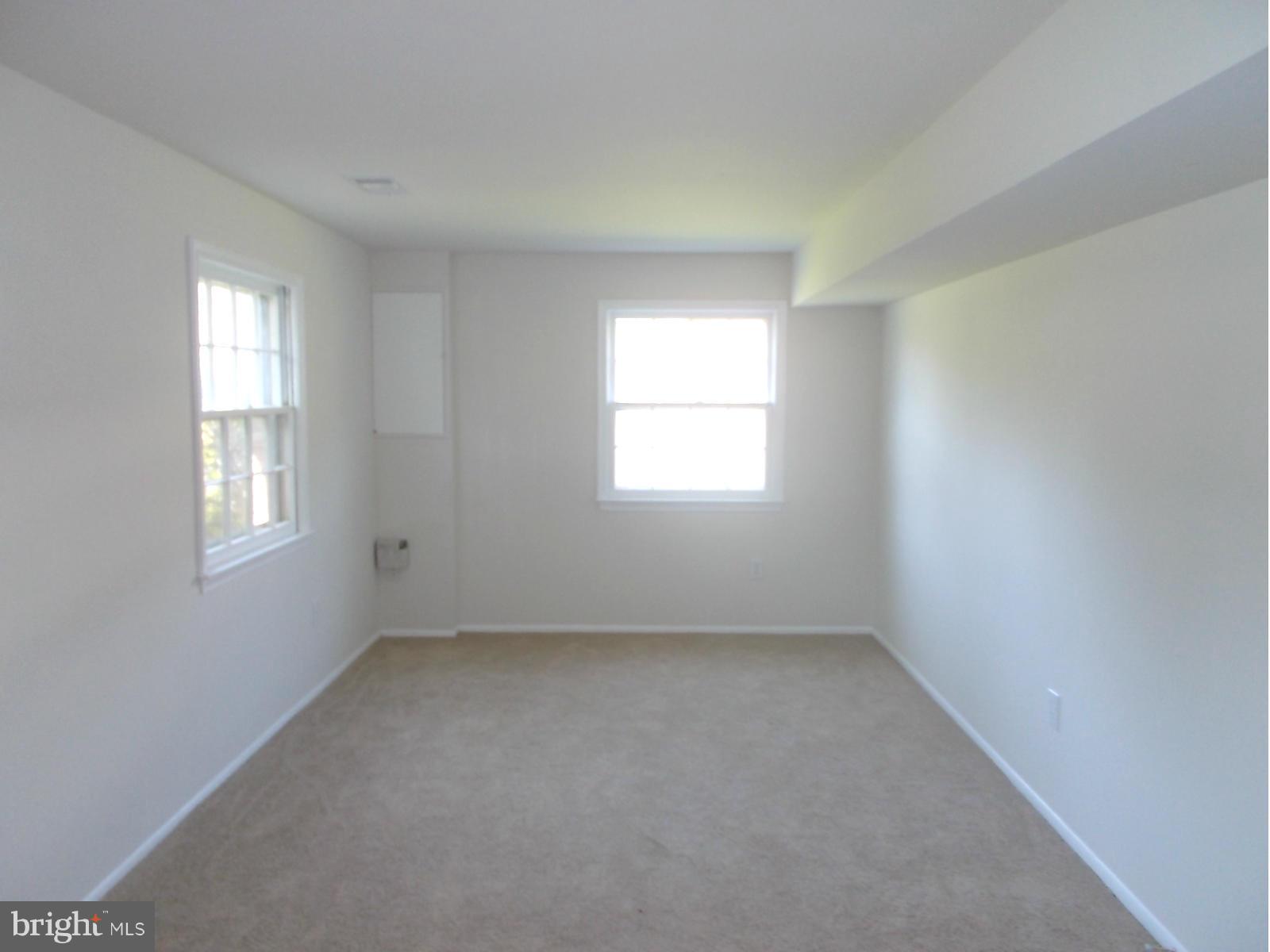 3529 Falling Green Road Olney, MD 20832 - Photo 13 of 16 an empty room with a window
