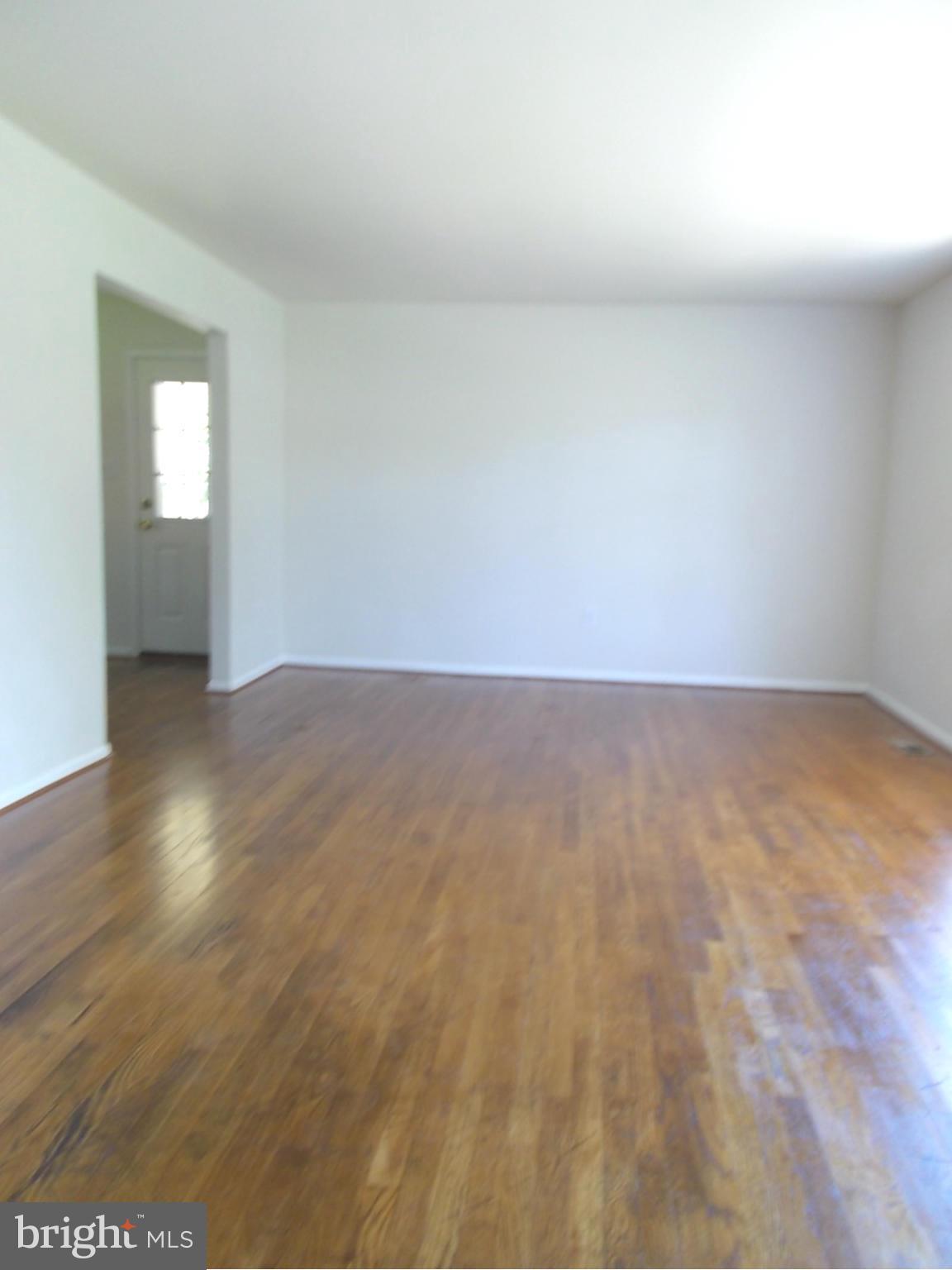 3529 Falling Green Road Olney, MD 20832 - Photo 5 of 16 a view of an empty room and window