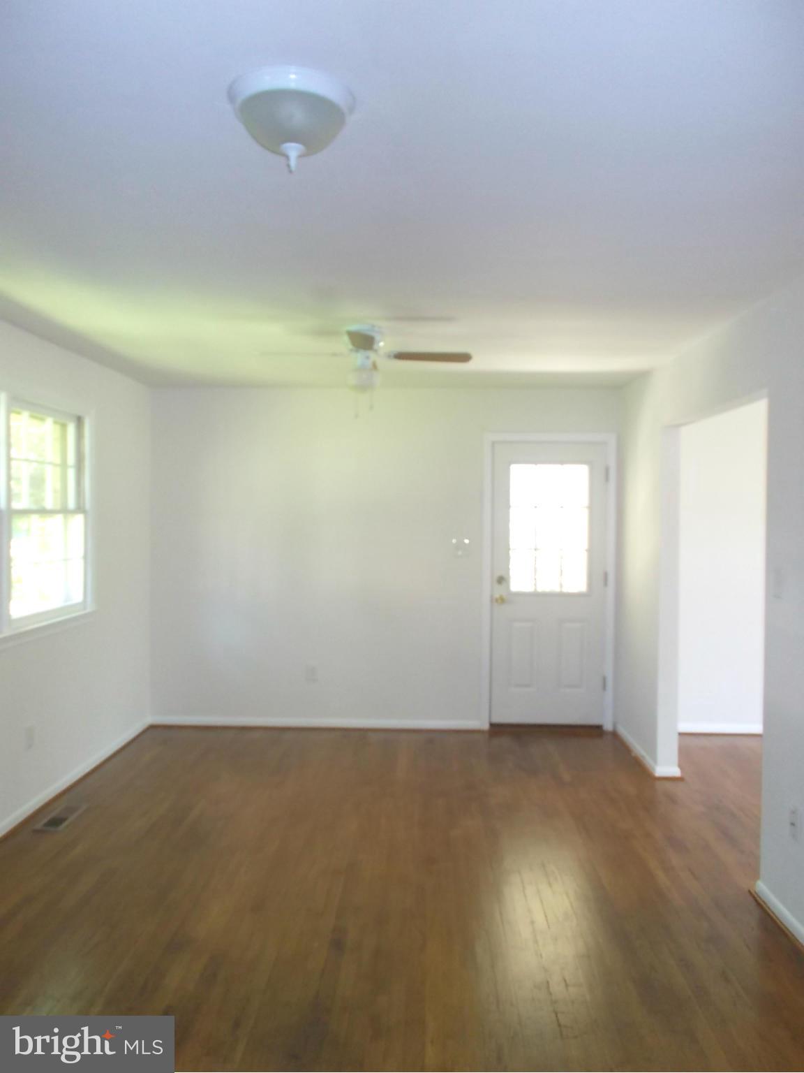 3529 Falling Green Road Olney, MD 20832 - Photo 7 of 16 an empty room with windows