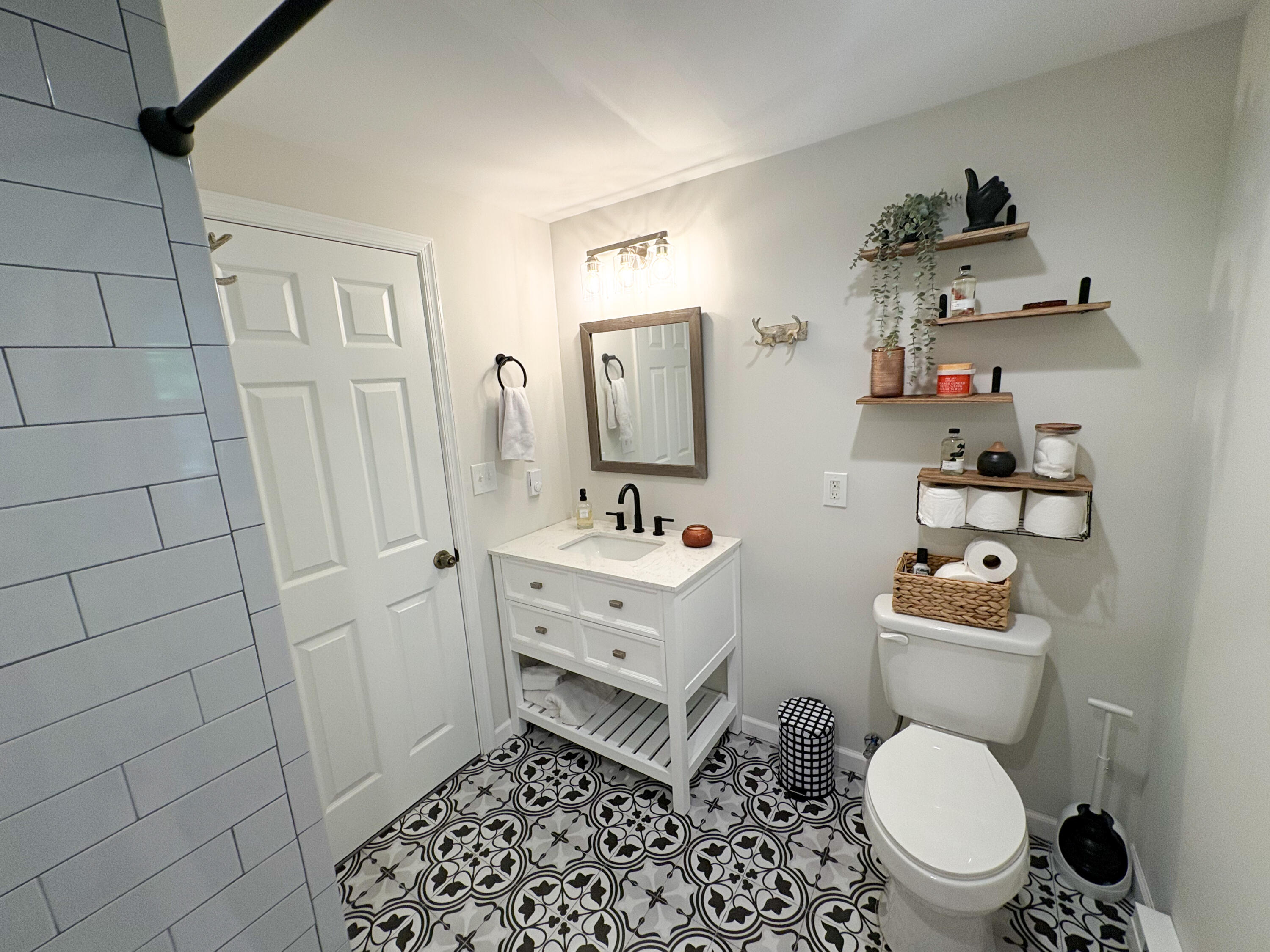 1085 Maple Lake Drive Bushkill, PA 18324 - Photo 11 of 35 a bathroom with a sink mirror vanity and toilet