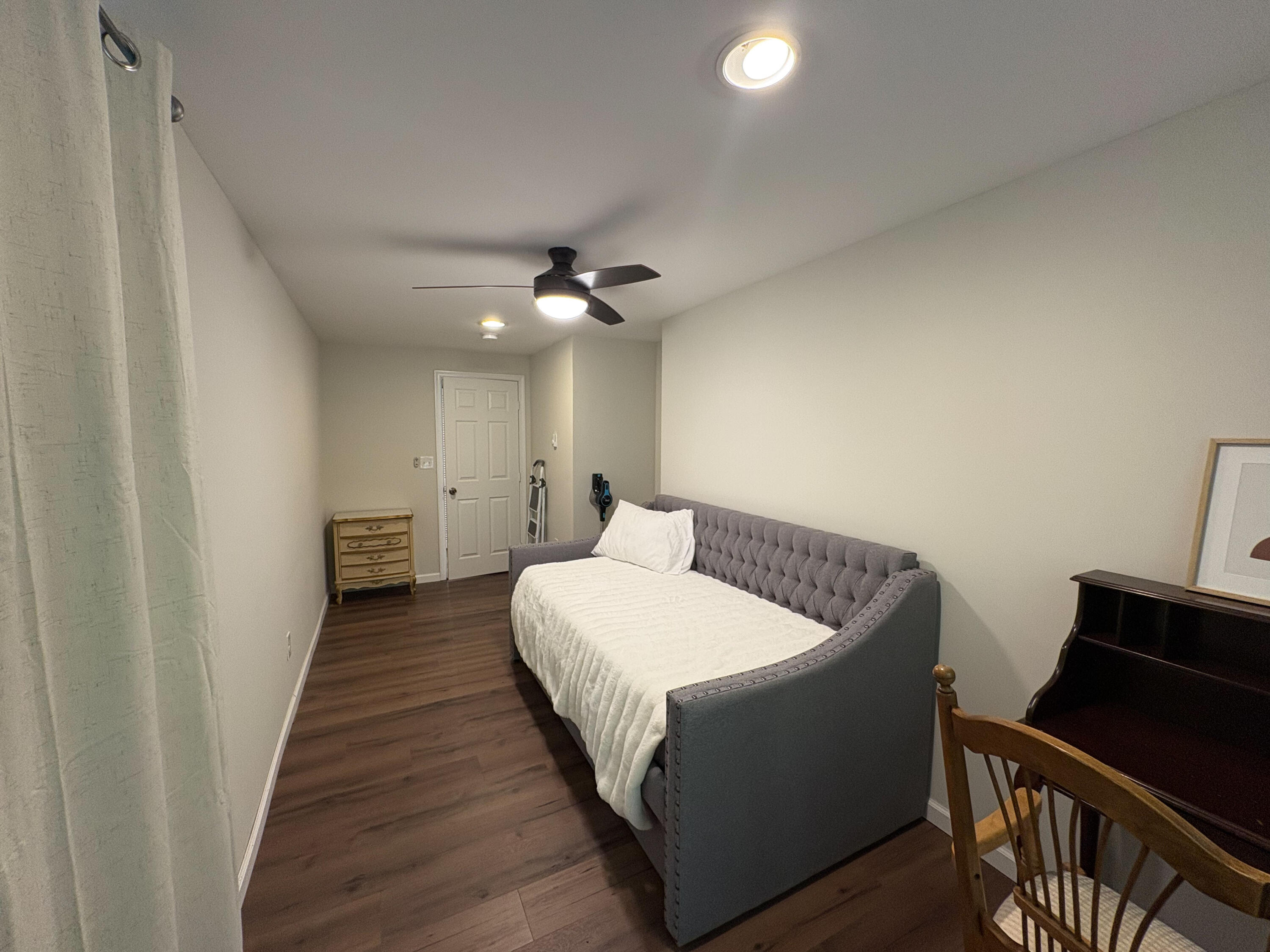 1085 Maple Lake Drive Bushkill, PA 18324 - Photo 12 of 35 a bed room with a bed and a chandelier