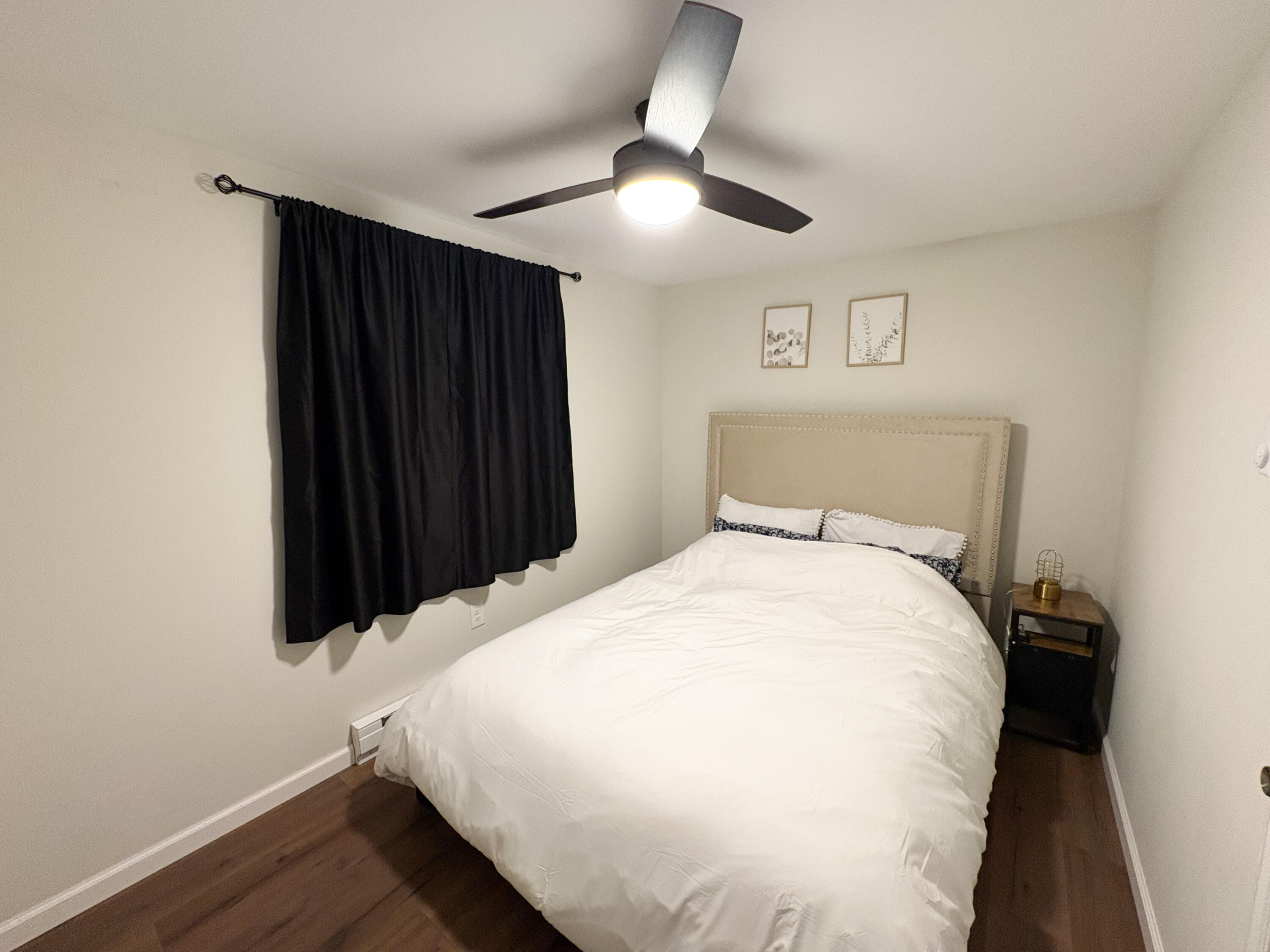 1085 Maple Lake Drive Bushkill, PA 18324 - Photo 14 of 35 a bed room with a bed and a black wall