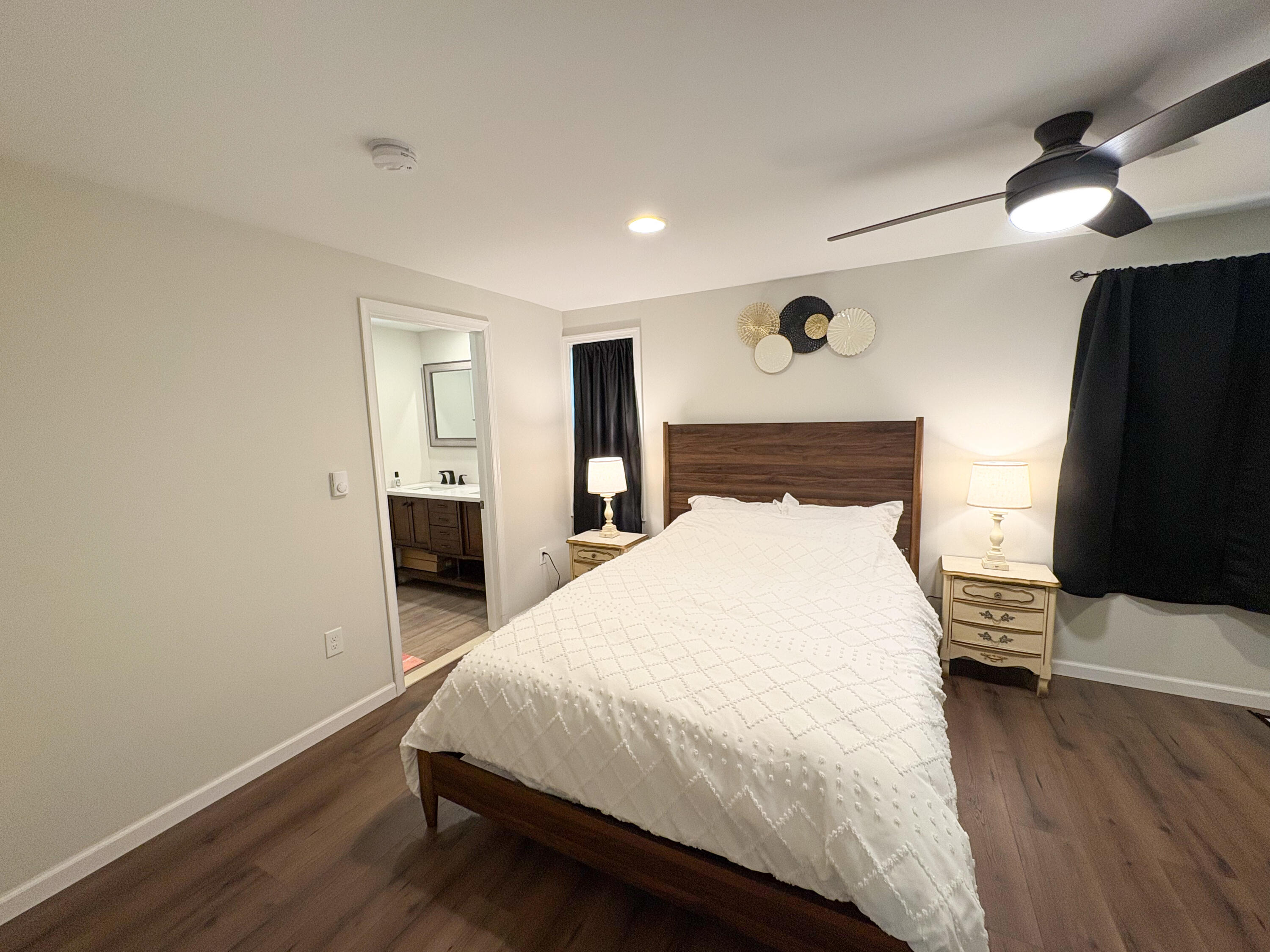 1085 Maple Lake Drive Bushkill, PA 18324 - Photo 16 of 35 a large bed sitting in a bedroom and a table