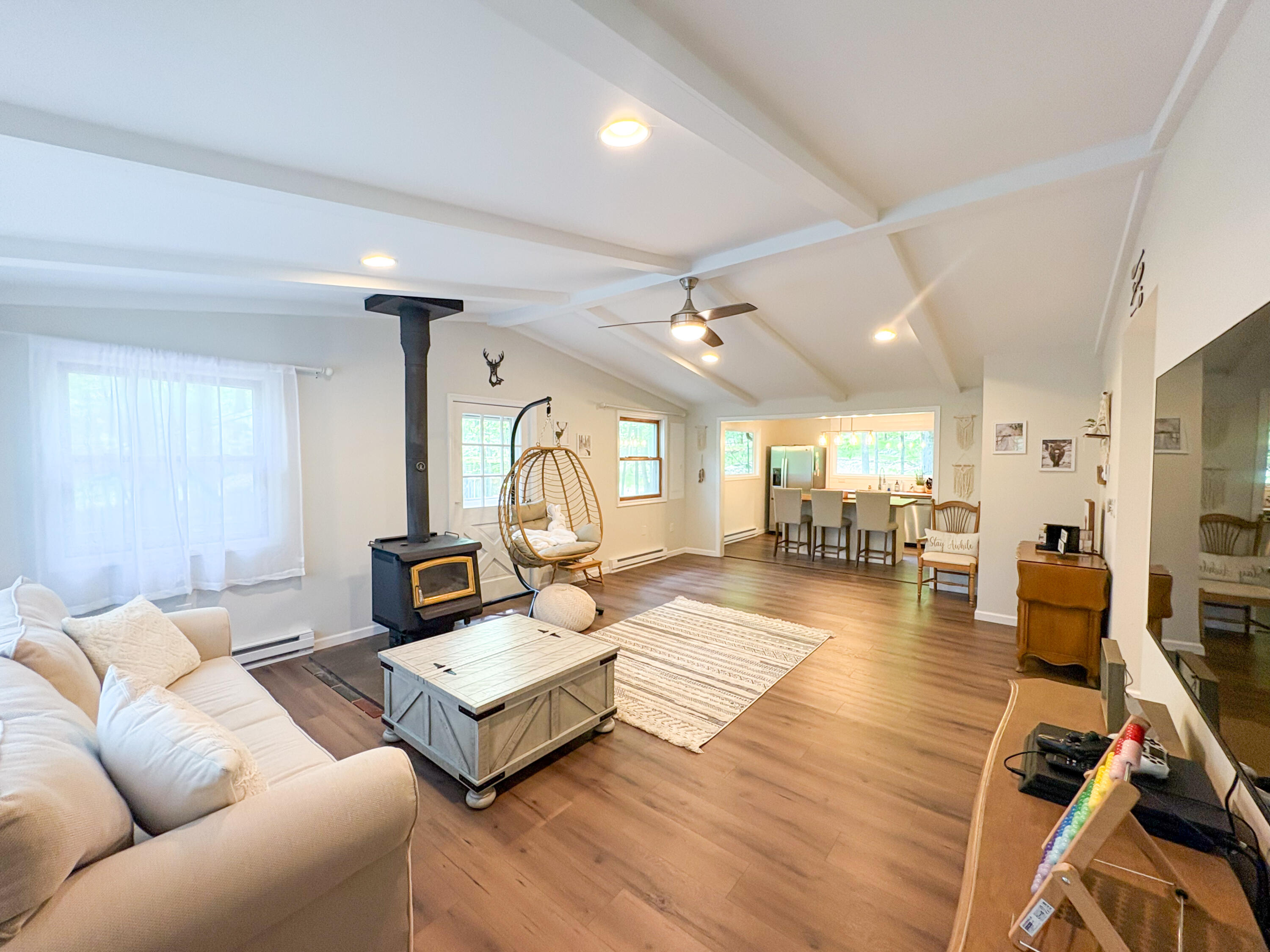 1085 Maple Lake Drive Bushkill, PA 18324 - Photo 2 of 35 a living room with furniture fireplace and a table