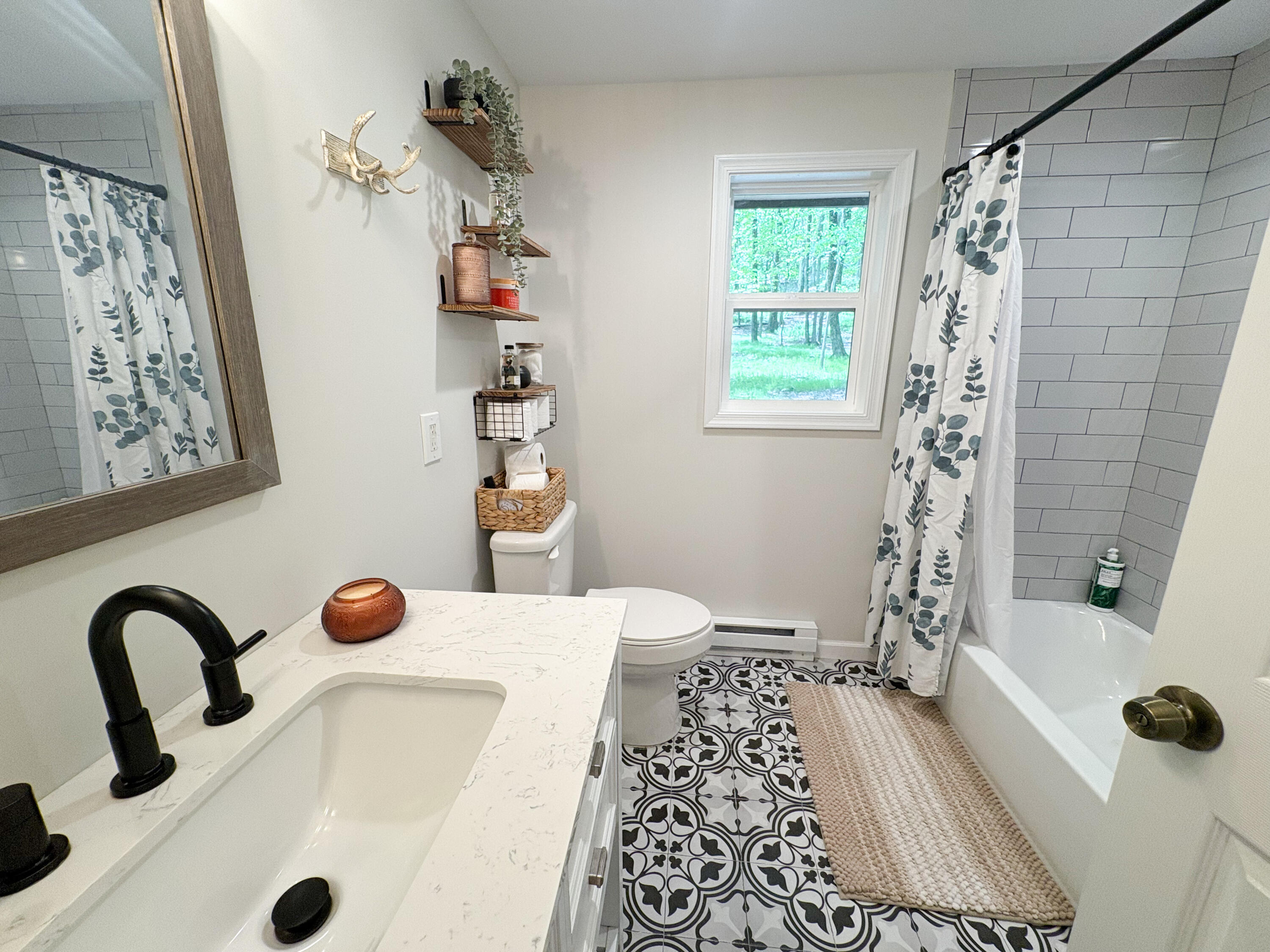 1085 Maple Lake Drive Bushkill, PA 18324 - Photo 35 of 35 a bathroom with a tub and a shower
