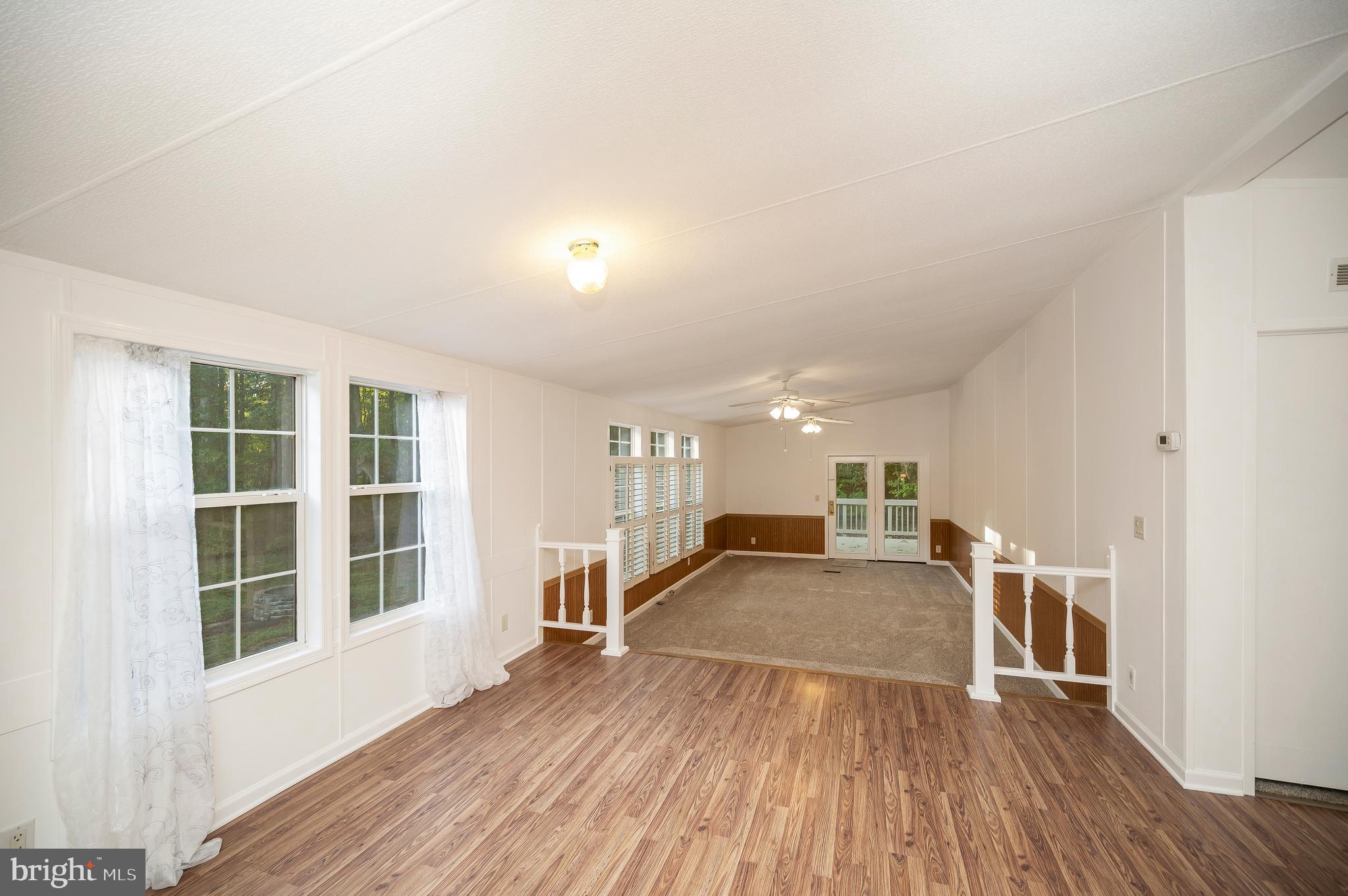 9863 Red Hill Road Spotsylvania, VA 22553 - Photo 26 of 53 a view of a house with wooden floor and windows