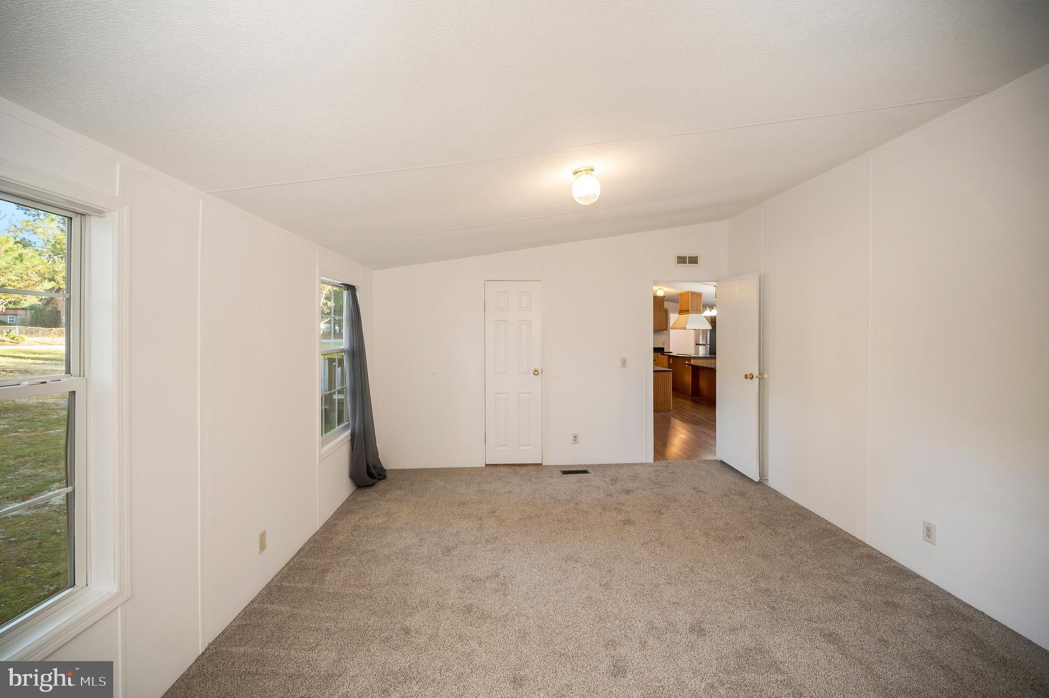 9863 Red Hill Road Spotsylvania, VA 22553 - Photo 30 of 53 a view of an empty room with a window