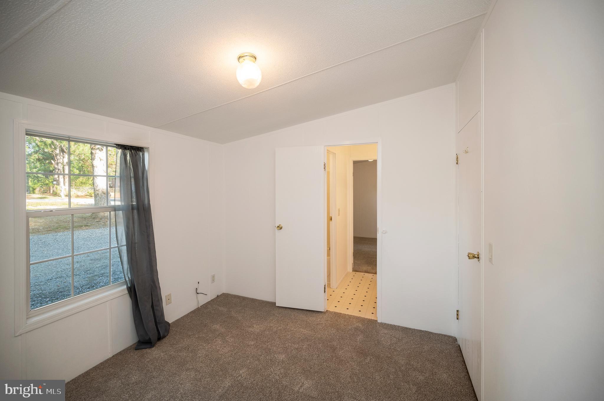 9863 Red Hill Road Spotsylvania, VA 22553 - Photo 36 of 53 an empty room with windows