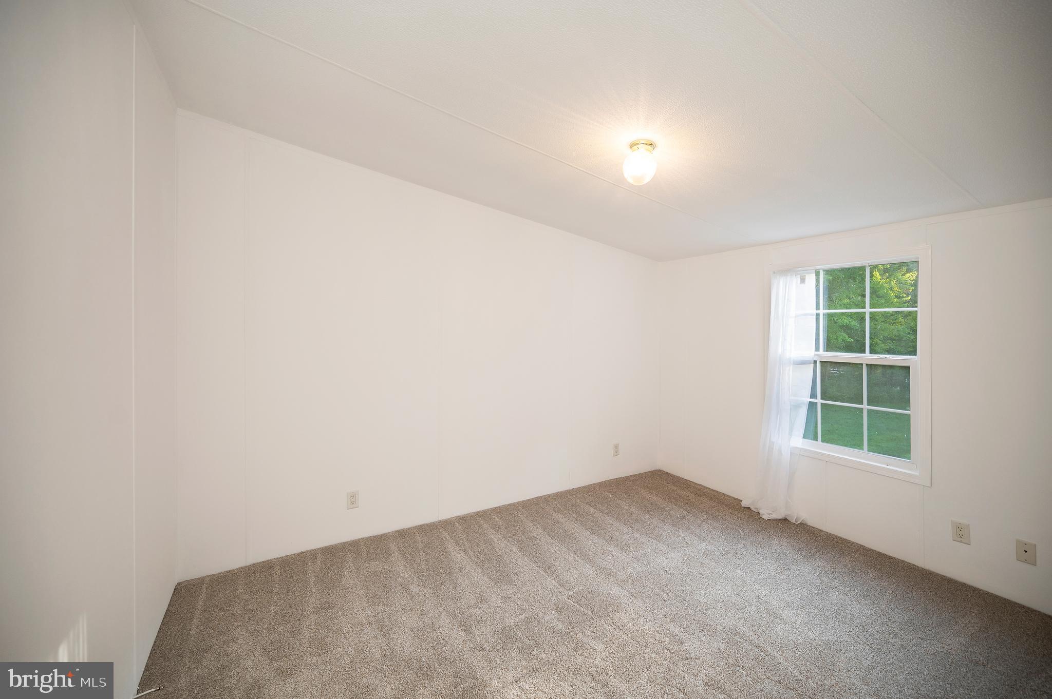 9863 Red Hill Road Spotsylvania, VA 22553 - Photo 40 of 53 an empty room with a window