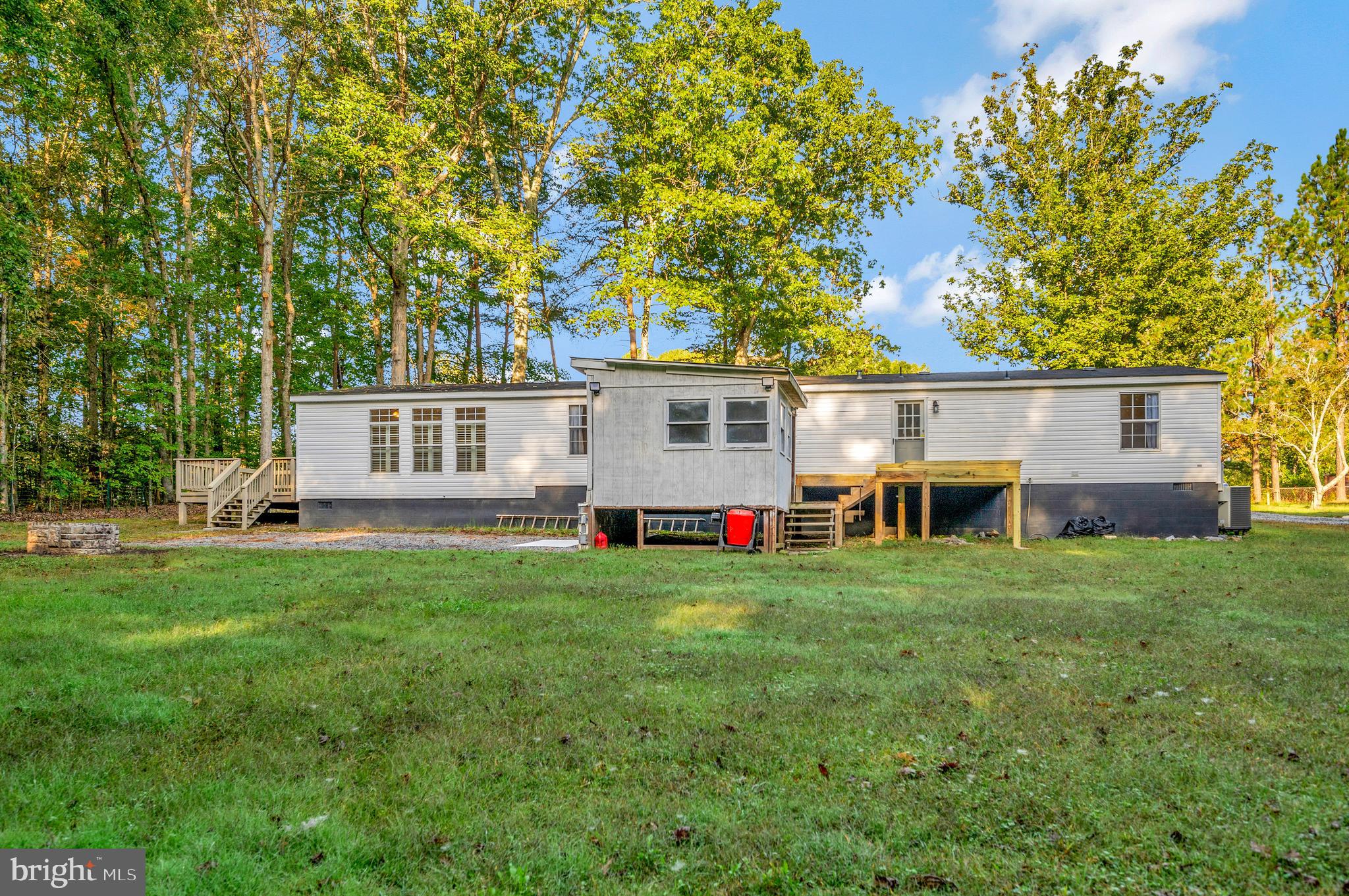 9863 Red Hill Road Spotsylvania, VA 22553 - Photo 49 of 53 a view of a house with backyard and garden