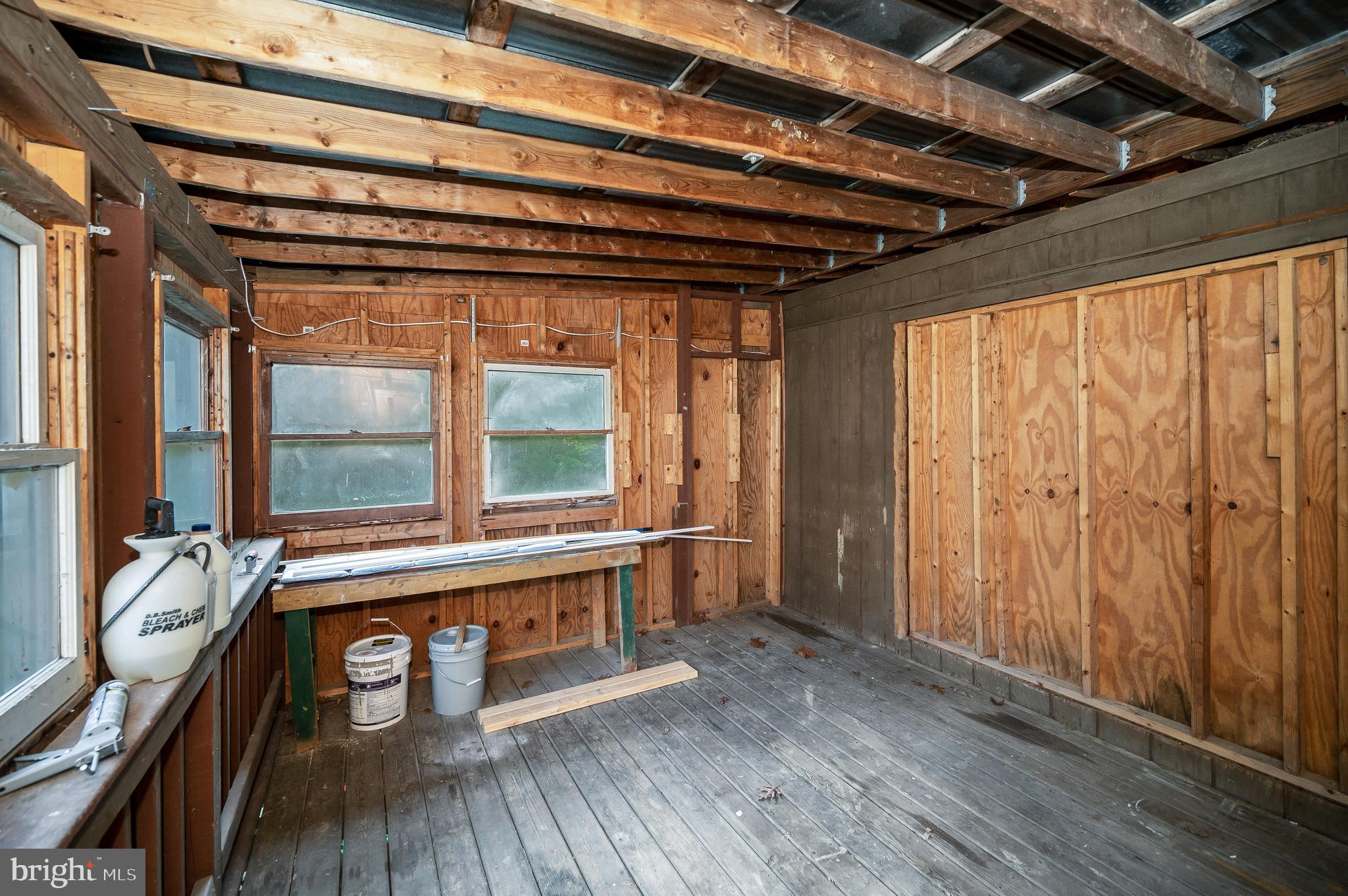 9863 Red Hill Road Spotsylvania, VA 22553 - Photo 50 of 53 a view of a room with wooden floor and furniture