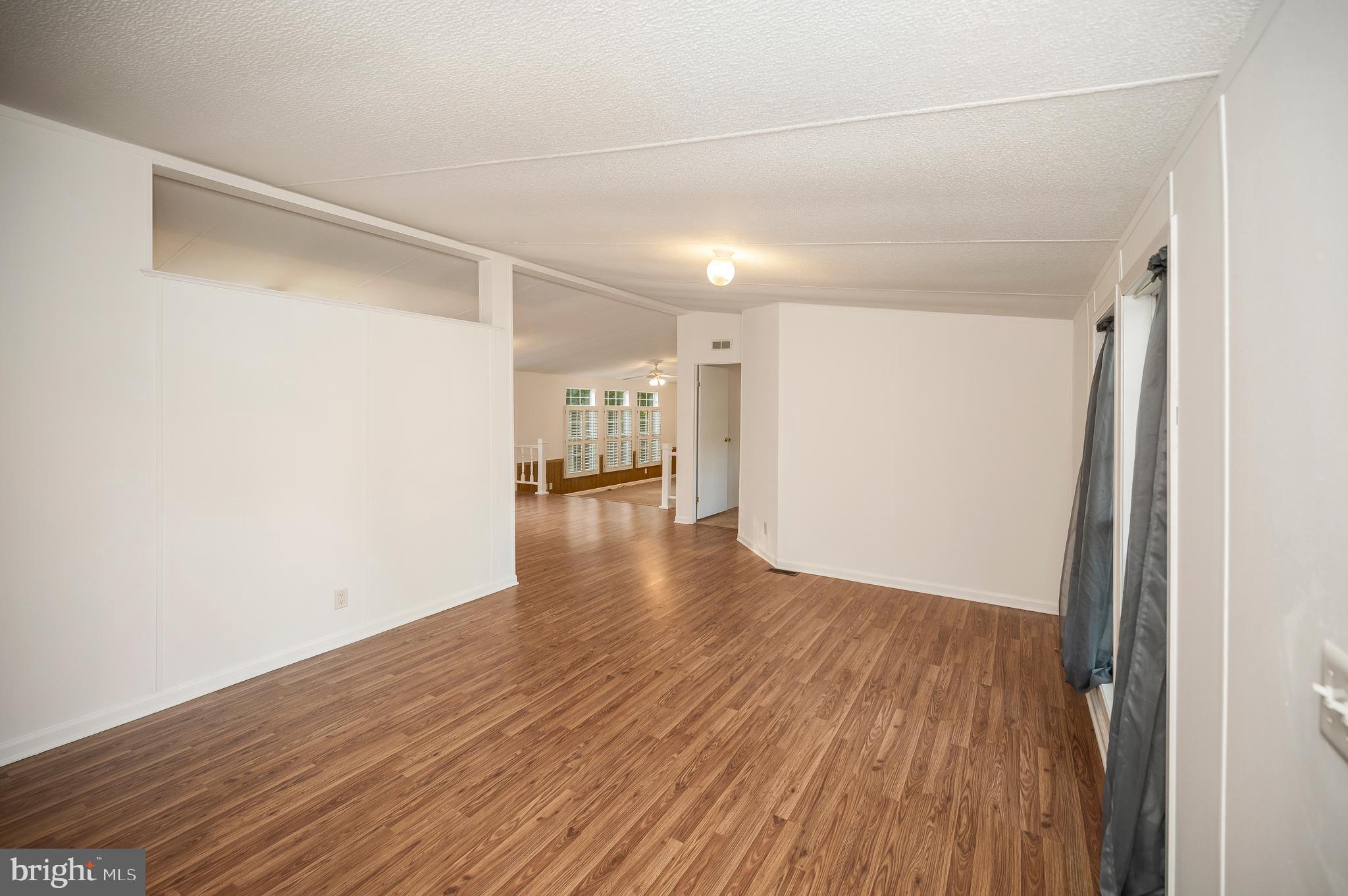 9863 Red Hill Road Spotsylvania, VA 22553 - Photo 10 of 53 a view of a room with wooden floor