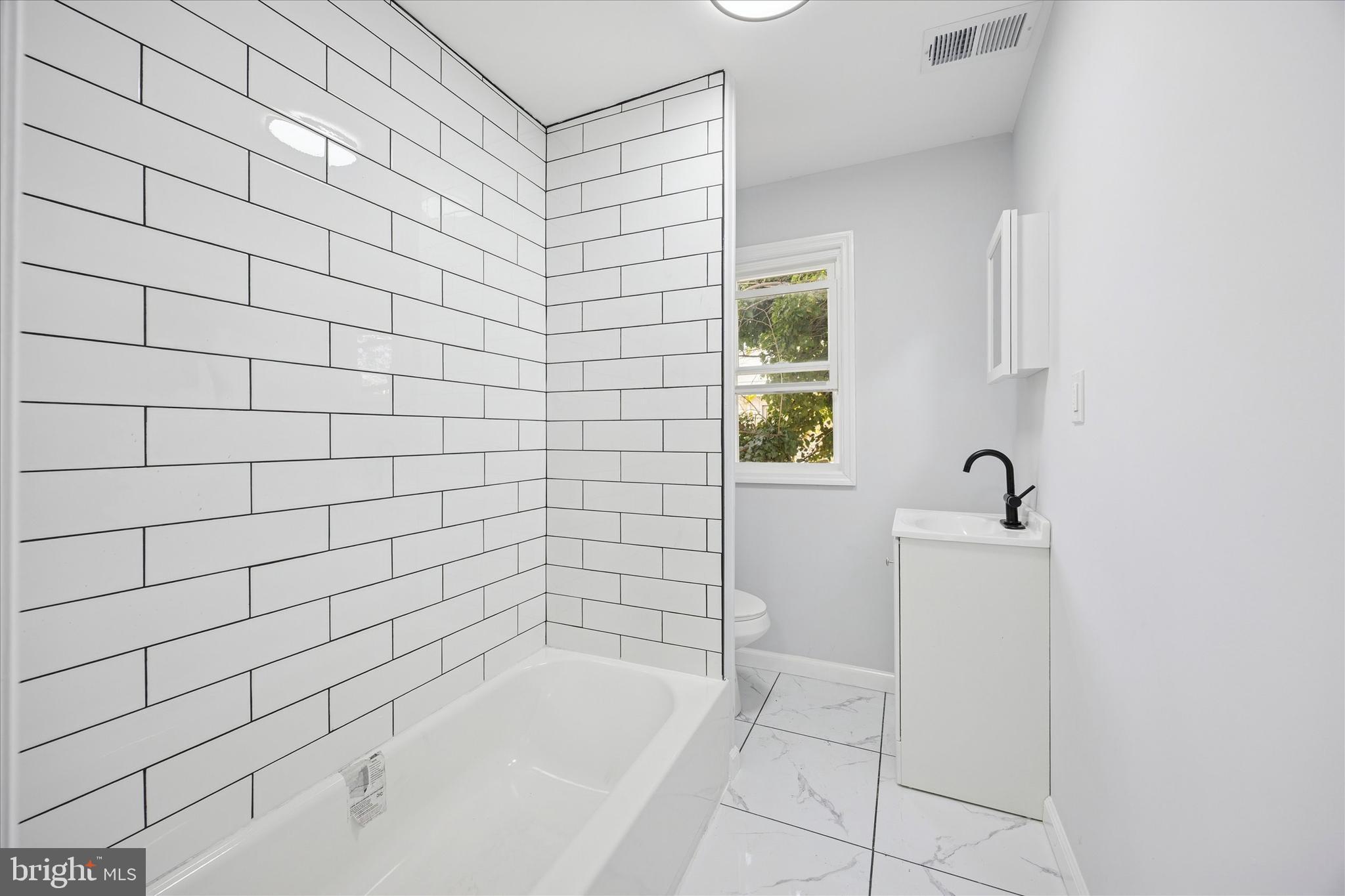 566 Rutherford Avenue, Unit 2 Trenton, NJ 08618 - Photo 8 of 16 bathroom