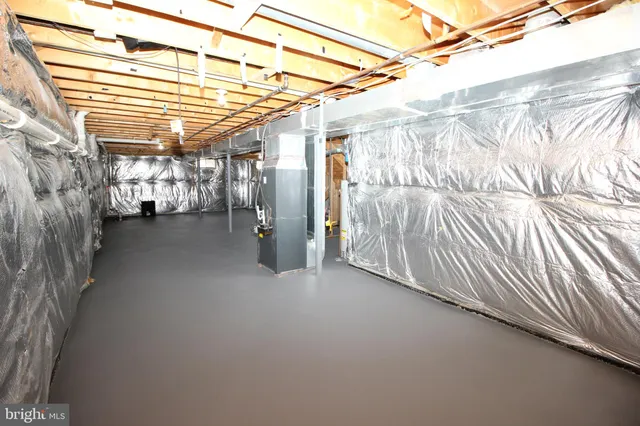 a view of a room with wooden walls