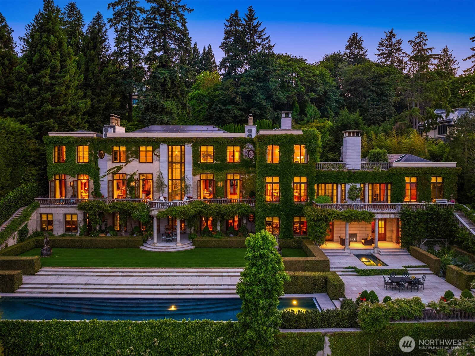 Undisclosed Address Seattle, WA 98112 - Photo 1 of 15 a front view of a house with a yard