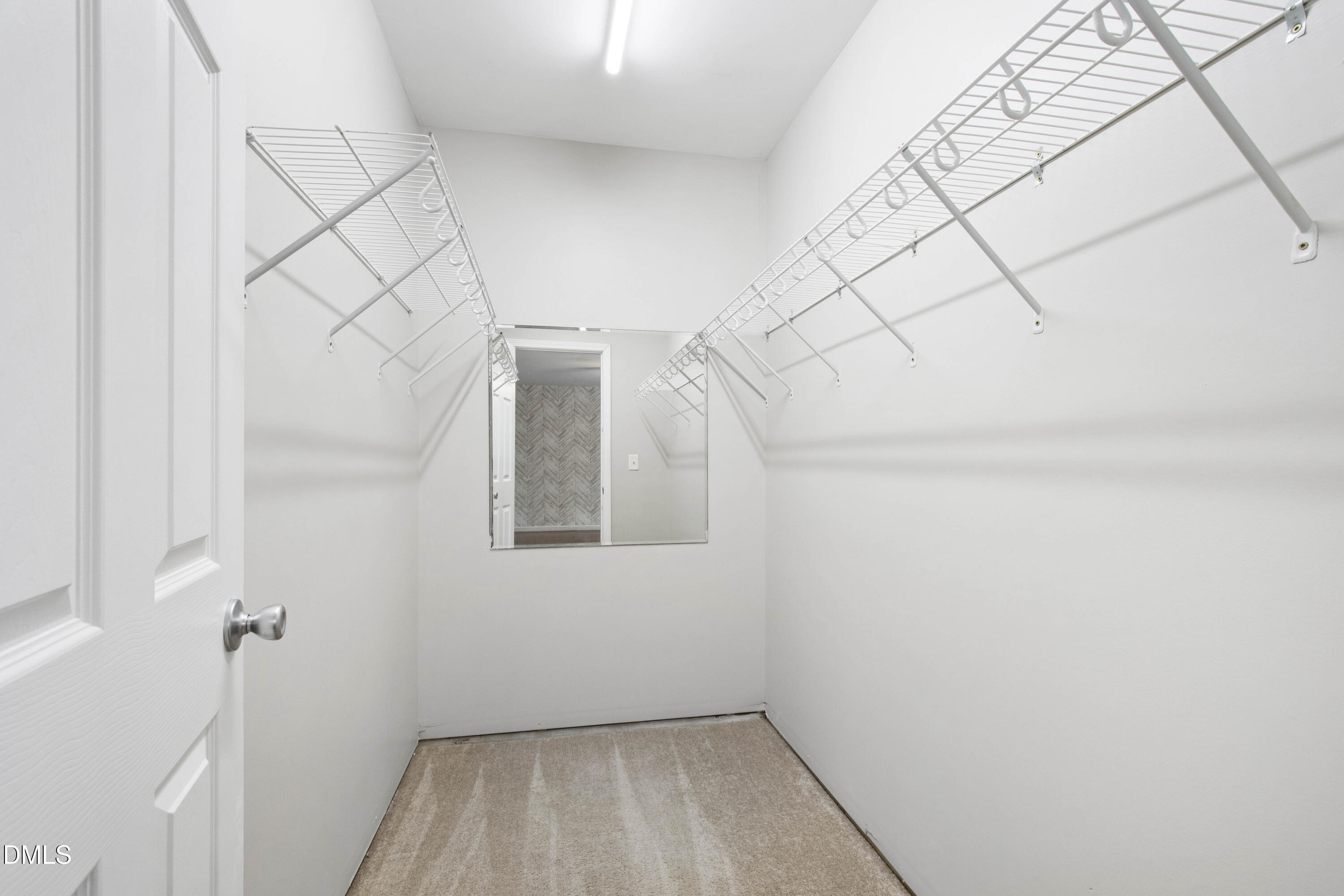 2415 Dorety Place Raleigh, NC 27604 - Photo 16 of 53 a view of small space with empty racks on the wall