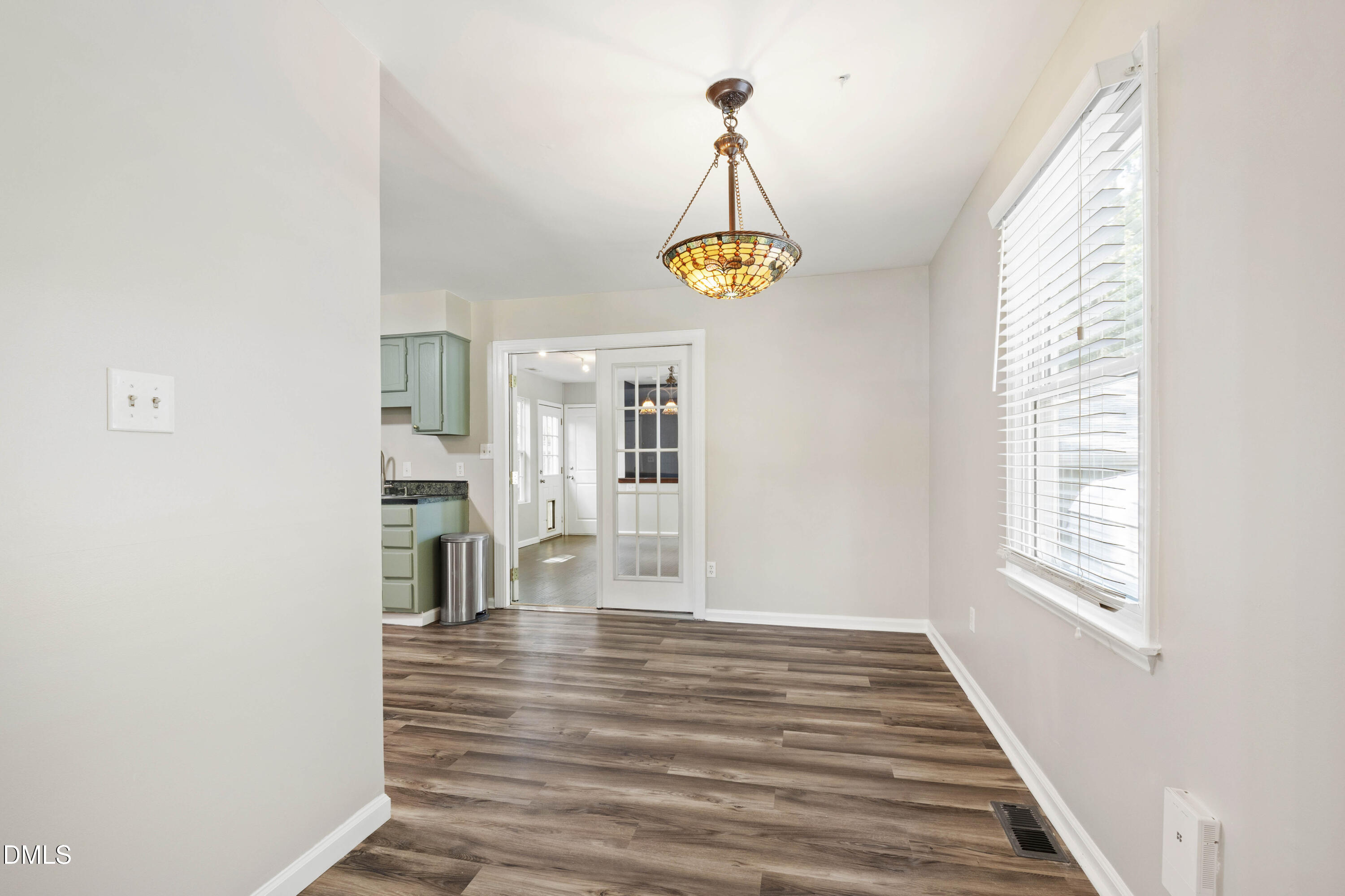2415 Dorety Place Raleigh, NC 27604 - Photo 27 of 53 a view of empty room with wooden floor