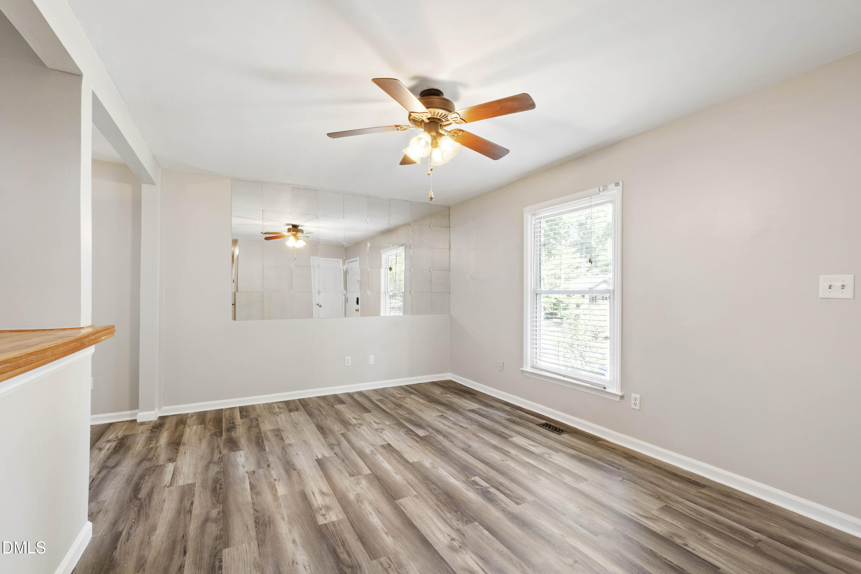 2415 Dorety Place Raleigh, NC 27604 - Photo 35 of 53 wooden floor in an empty room with a window