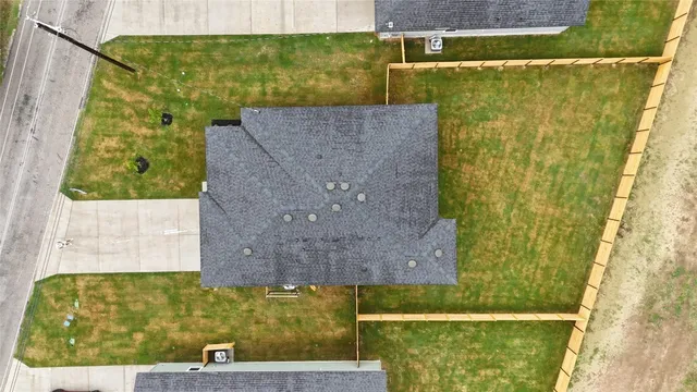 view of door with wooden floor