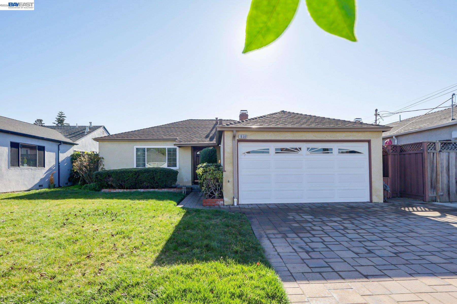1658 Vía Rancho San Lorenzo, CA 94580 - Photo 1 of 1 a view of a house with a yard and garage