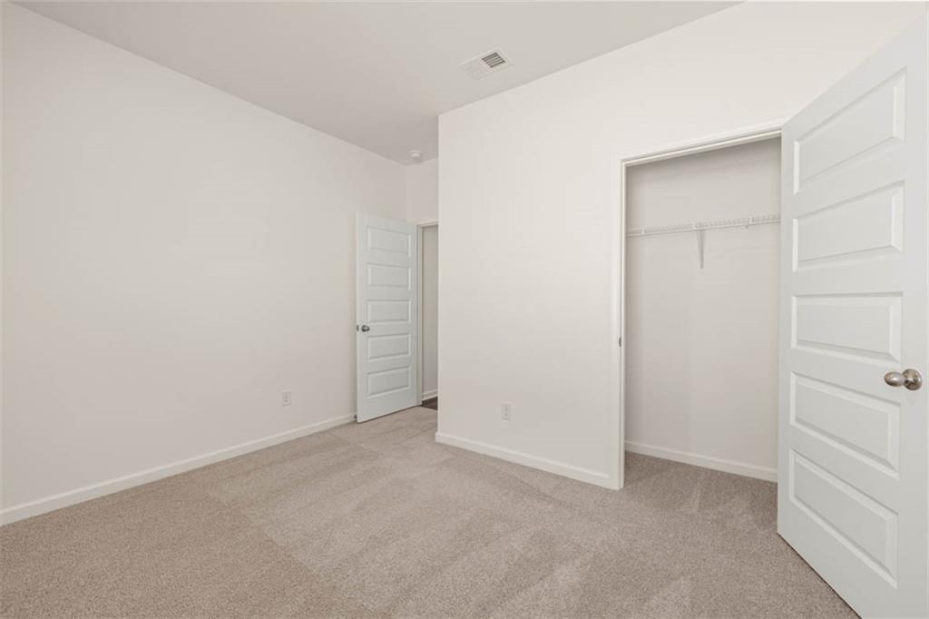 6010 Knickerbocker Street Mableton, GA 30126 - Photo 11 of 12 a view of an empty room