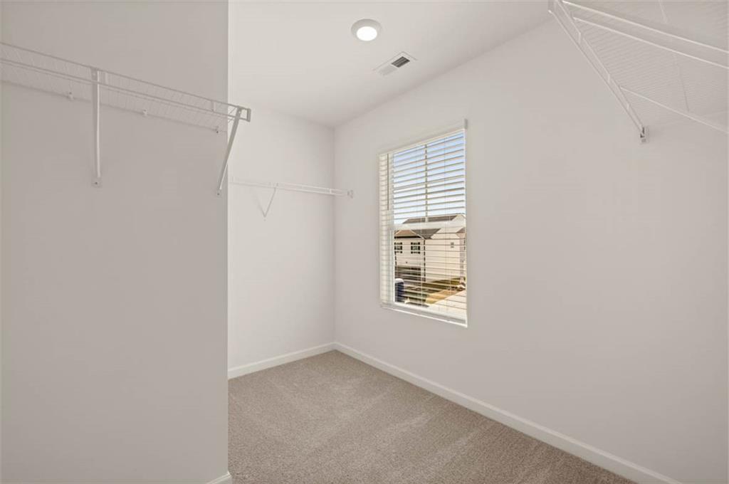 6010 Knickerbocker Street Mableton, GA 30126 - Photo 7 of 12 a view of an empty room with a window