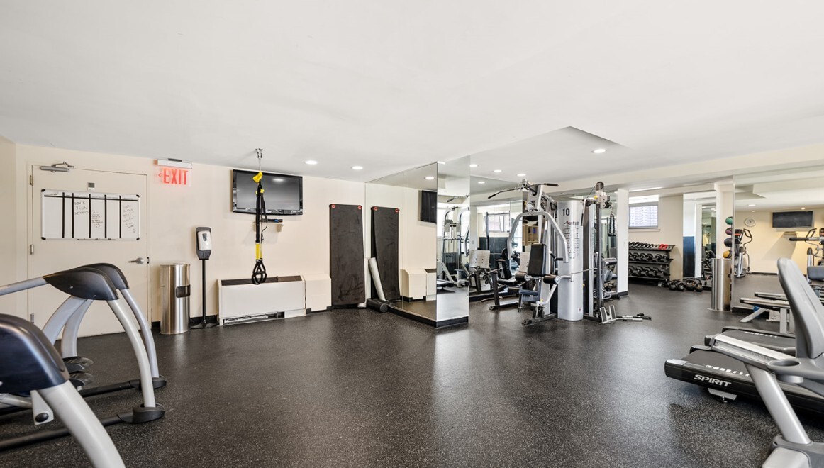 1485 5th Avenue, Unit 13A Manhattan, NY 10035 - Photo 13 of 16 a view of a room with gym equipment