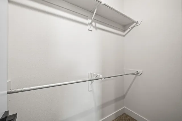 a bathroom with a toilet and a bathtub