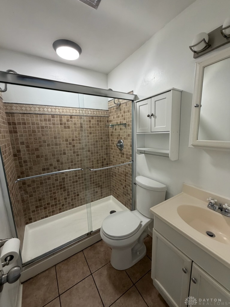 4924 Bayside Drive Riverside, OH 45431 - Photo 16 of 21 This bright bathroom features a convenient shower and practical vanity, perfect for daily routines.