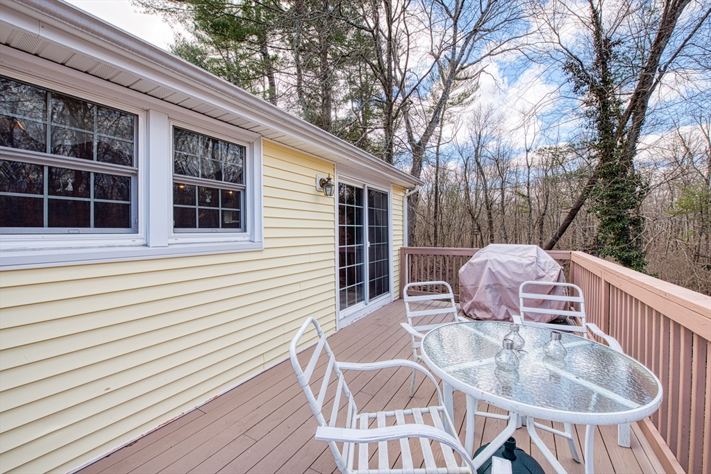 10 Colby Road Bridgewater, MA 02324 - Photo 13 of 42 a balcony with table and chairs