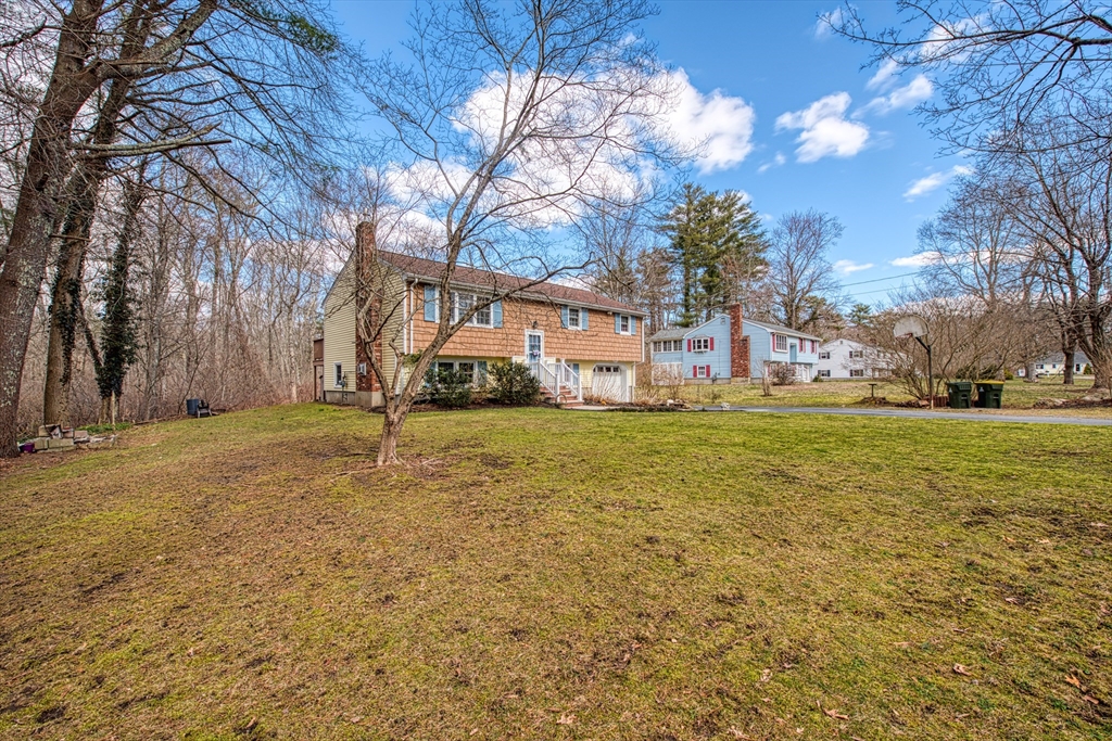 10 Colby Road Bridgewater, MA 02324 - Photo 14 of 42 a view of a yard with plants and trees