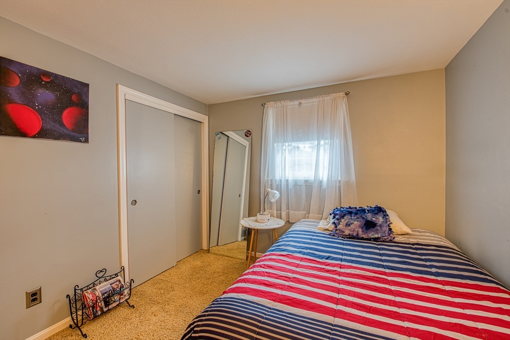 10 Colby Road Bridgewater, MA 02324 - Photo 24 of 42 a bedroom with a bed and a window